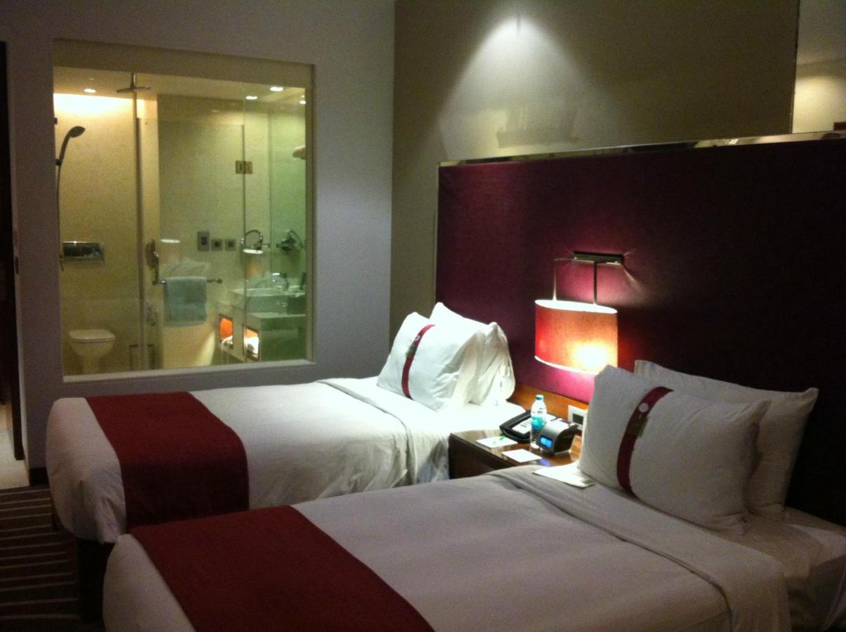 Standard Room with Two Single Beds with 15% off on Laundry, Dining, Spa, and Airport Transfers and Happy Hour at 72 Bar with buy 1 get 1 free on select beverages from 7pm - 9 PM