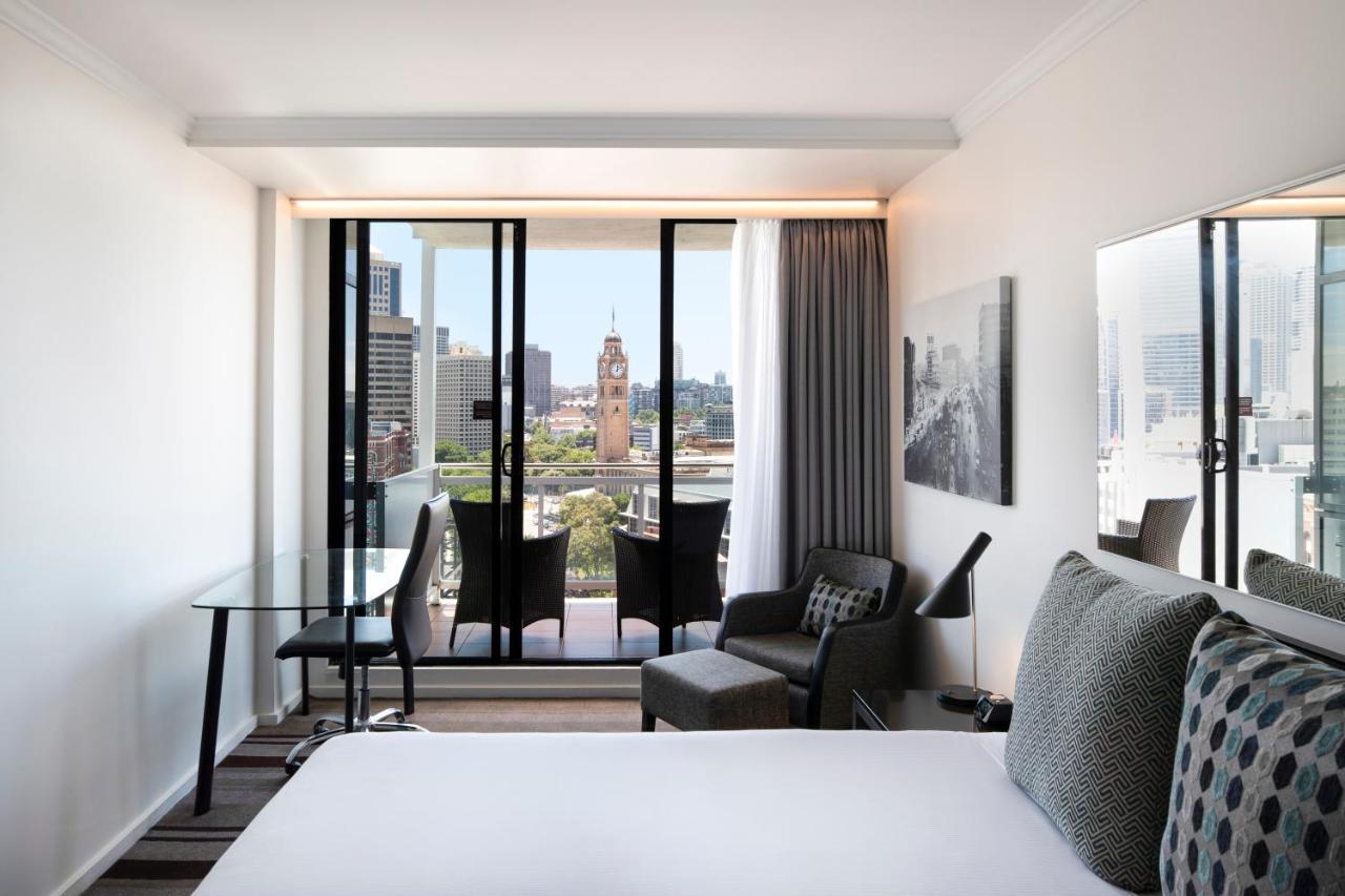 Queen Room with Balcony and City View