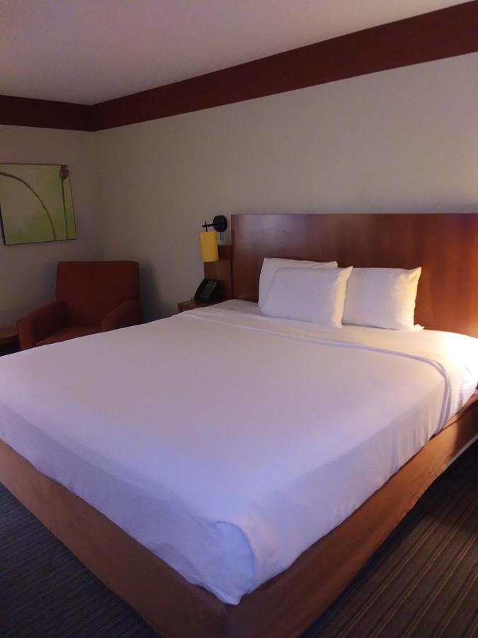 Two-Bedroom Suite with One King Bed and Two Double Beds