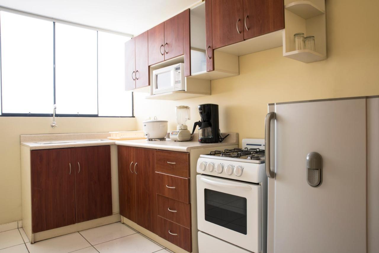 King Suite with Spa Bath and Balcony with Partial Ocean View