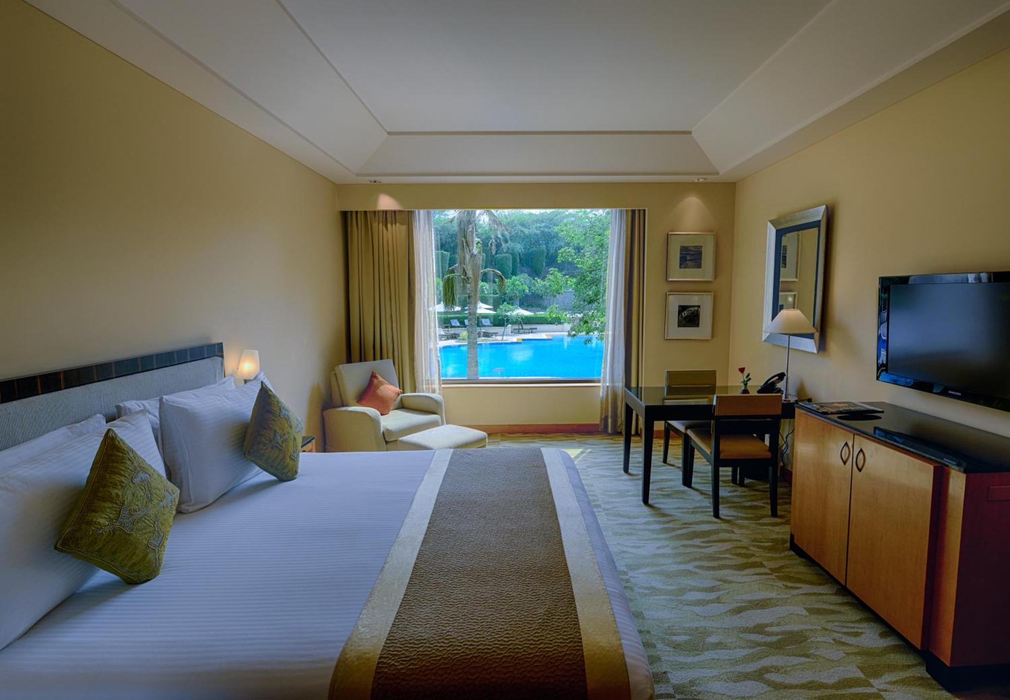 The Grand Deluxe Room with King Bed with 20% off on session of 30 mins Spa,15% off on food & soft beverage services,20% Discount on Laundry service (T&C applicable)