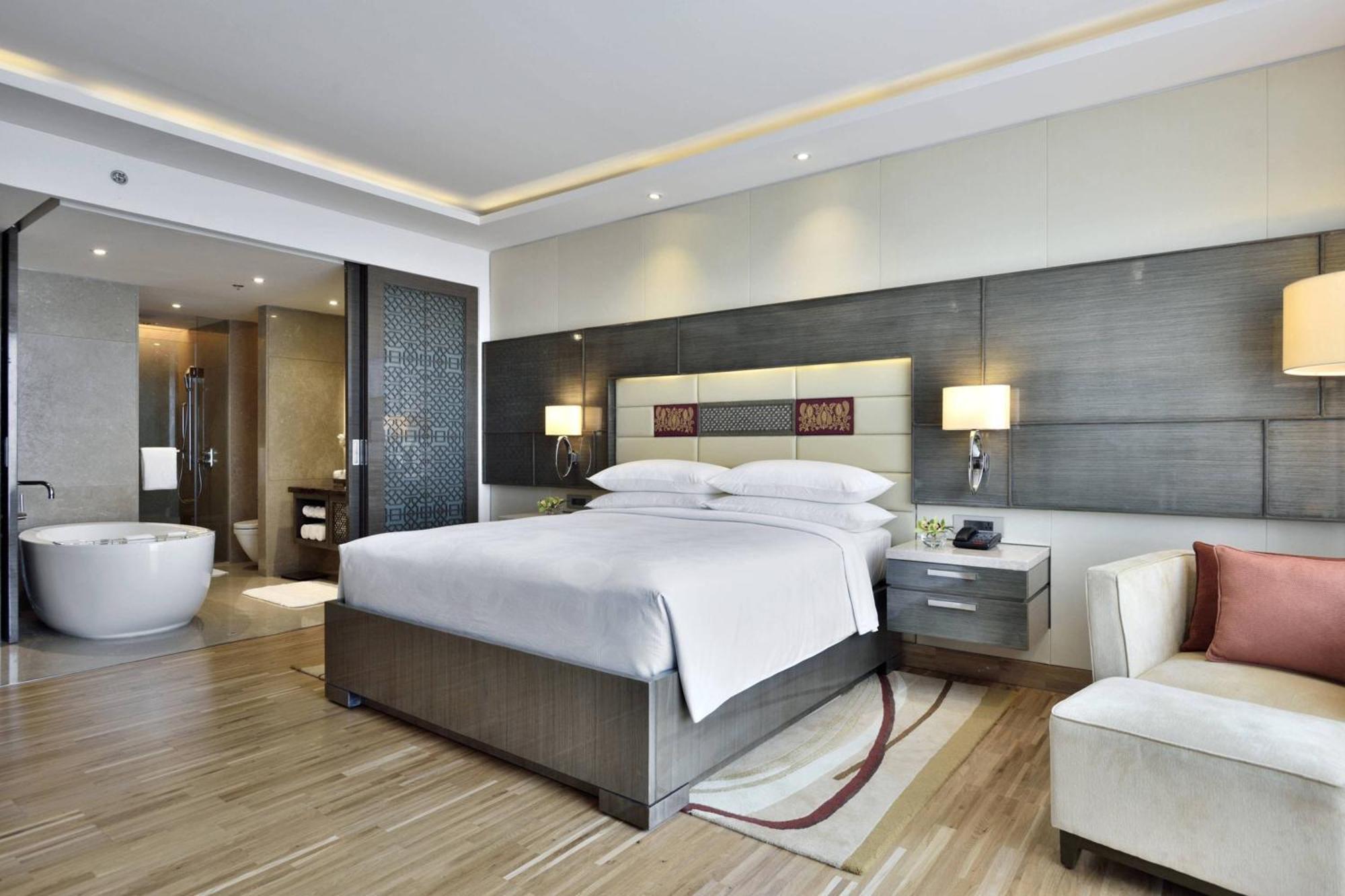Executive King Room Pool View Lounge Access & complimentary one-way airport transfer BOM T1 & T2