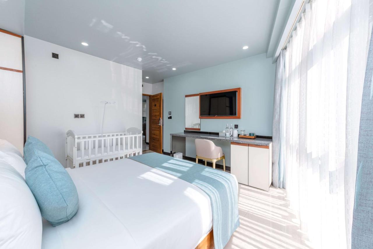 Two-Bedroom Suite Partial Sea View Return Airport Transport