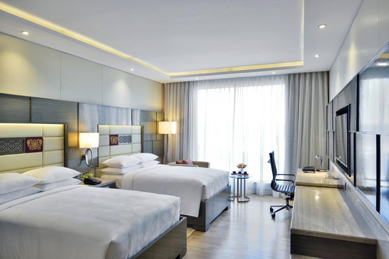 Guest Room Executive lounge access 2 Double Pool View & complimentary one-way airport transfer BOM T1 & T2