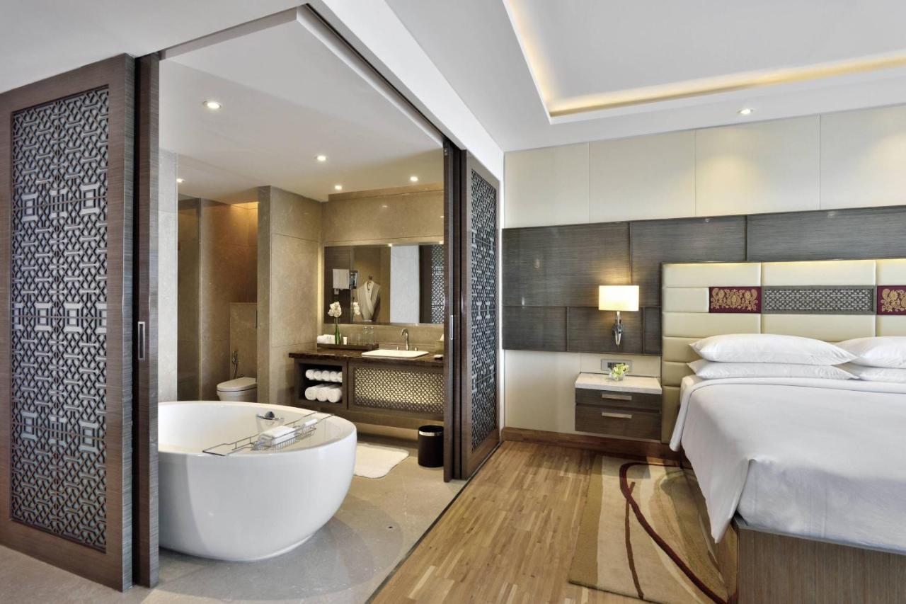 Guest Room Executive lounge access 2 Double Pool View & complimentary one-way airport transfer BOM T1 & T2