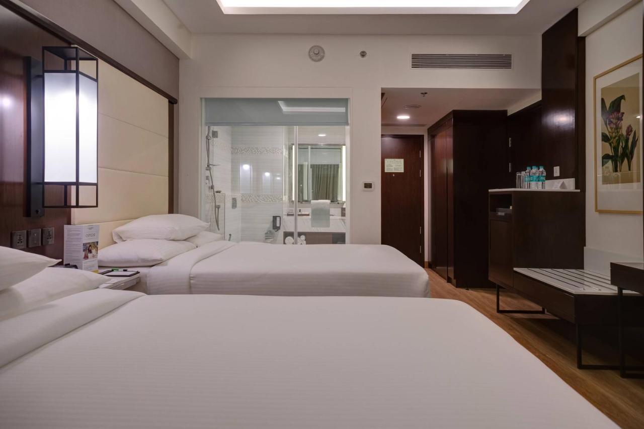 Deluxe Queen Room with 2 Queen Beds - Early Check-in and Late Check-out (Subject to Availability) - 10% Discount on F&B and Laundry till 15th September 2026