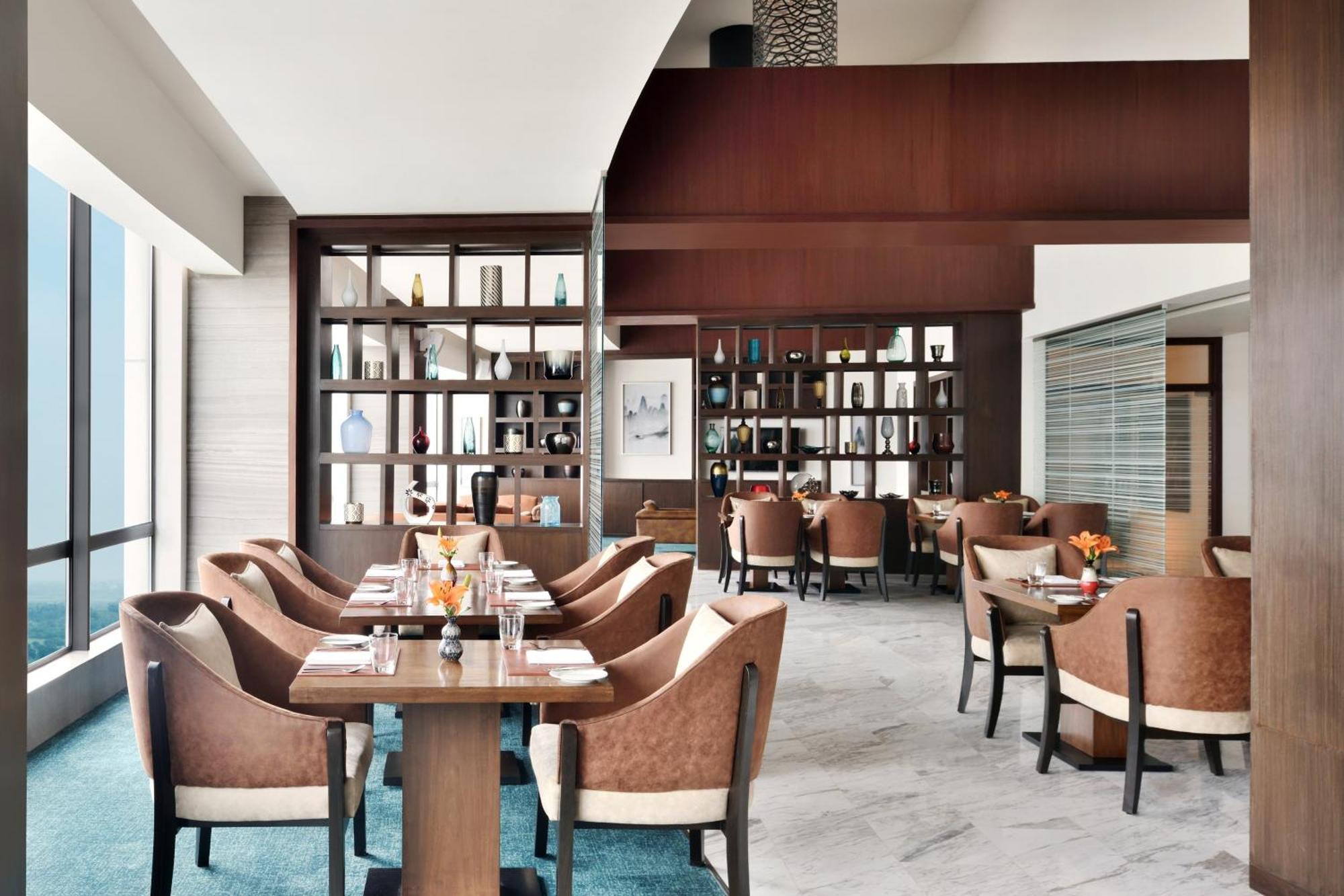 Lake View Suite with Lounge Access - INR 1,200 Hotel Credit per stay, 20% F&B Discount, Happy Hours (1 + 1 IMFL - 4 pm to 8 pm at 31/32) & 2 Way Airport Transfers