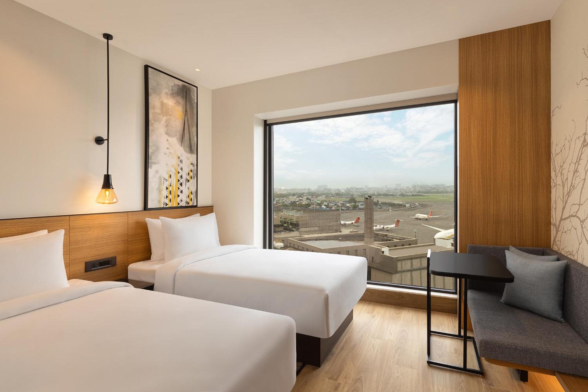 Deluxe Twin Room Garden View on Buffet on Airport Transfers Laundry Happy Hours on beverages enjoy 11 on select beverages