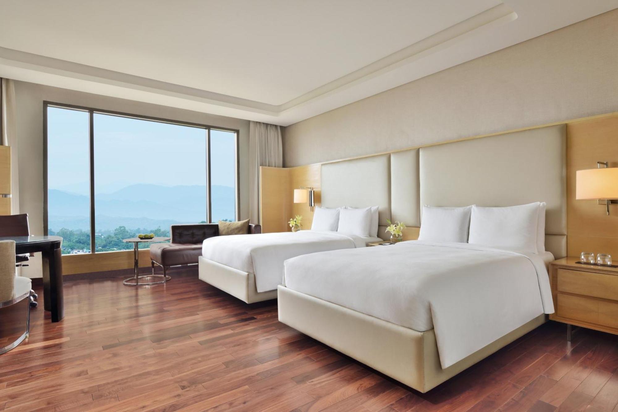Executive Twin Room complimentary & Club access unlimited IMFL Beverages 5PM to 7PM F&B at JW Café Saffron XO