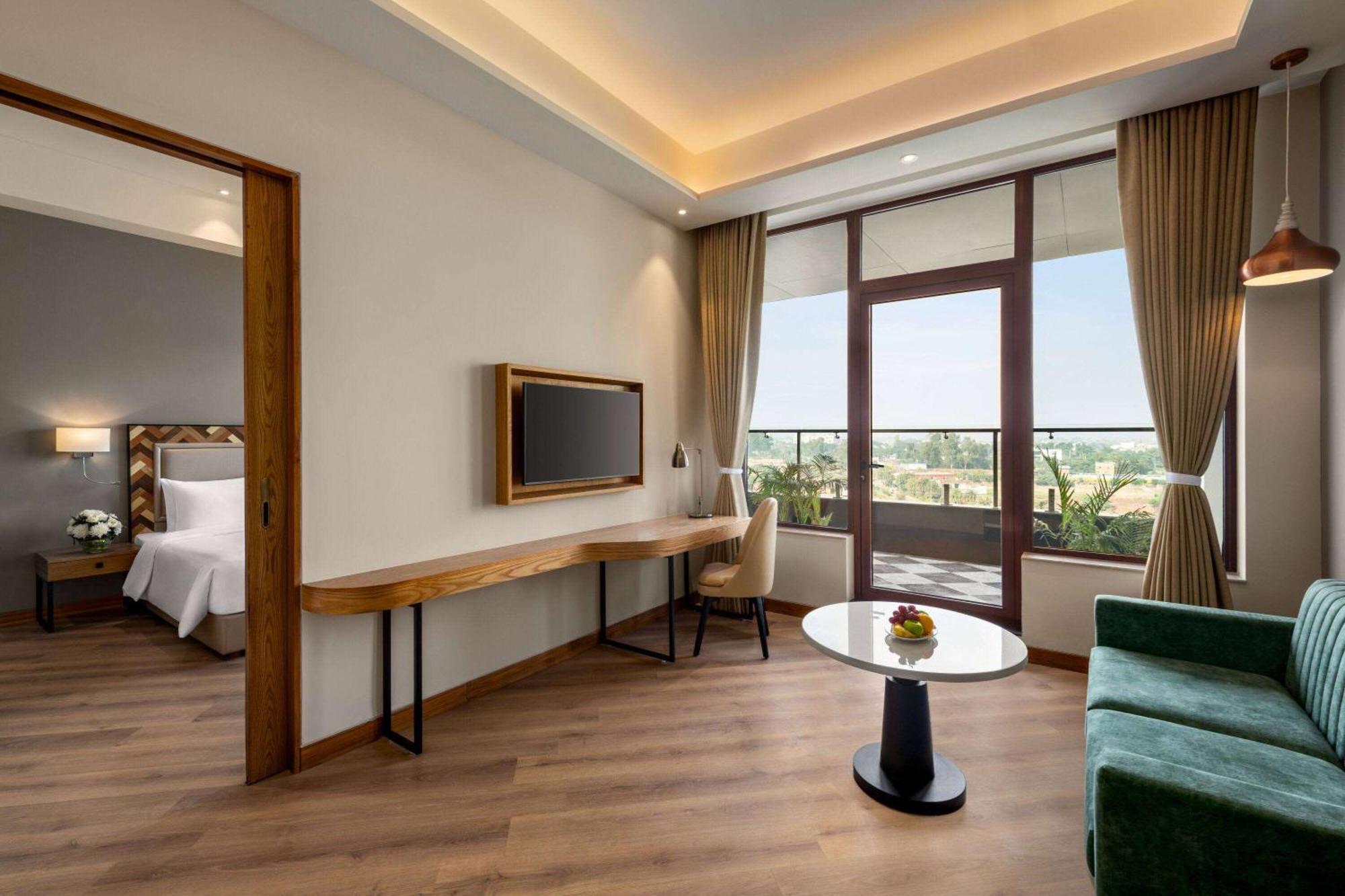 Junior King Suite with Living Room and Private Balcony