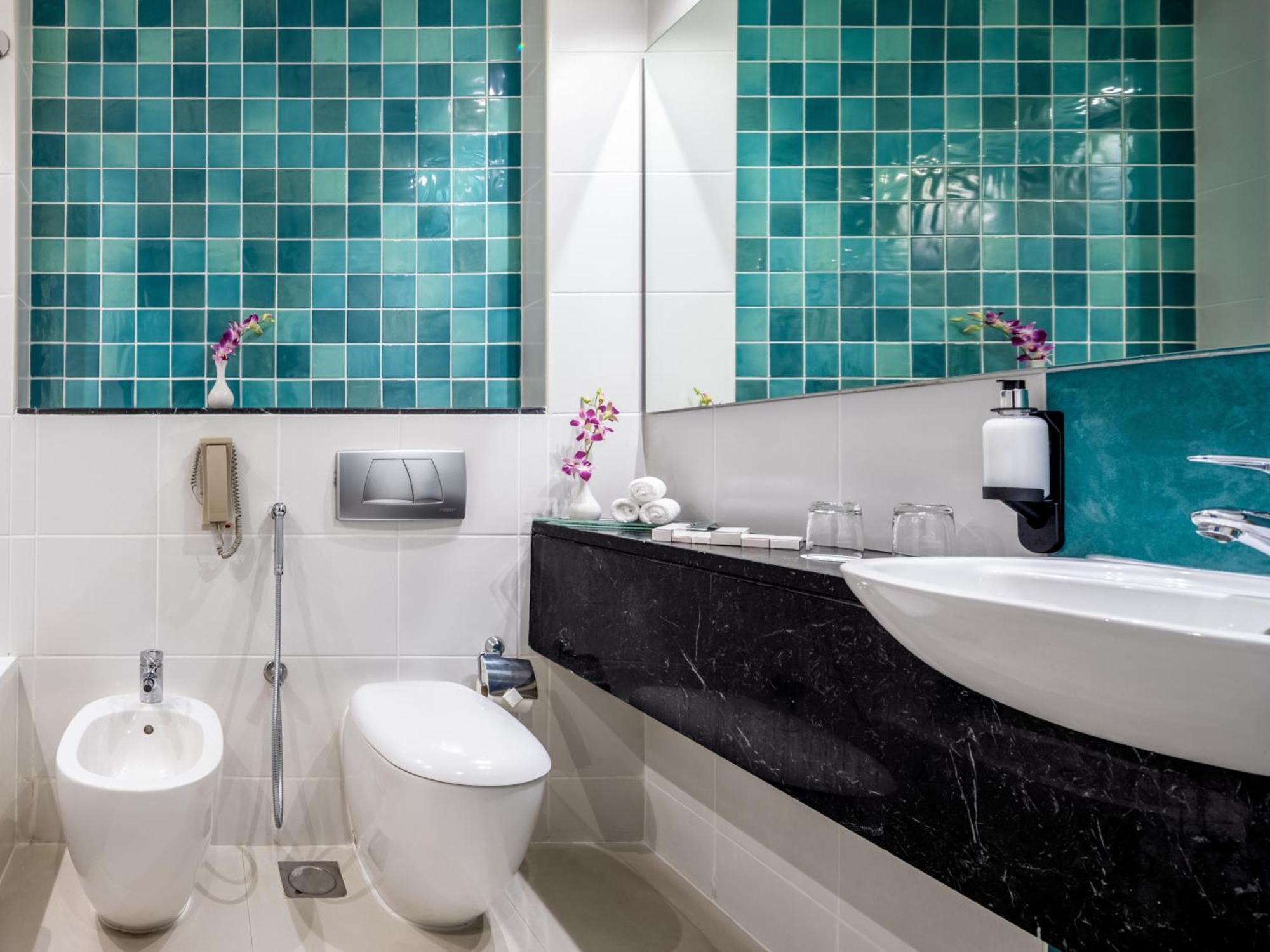 Two-Bedroom Apartment Kitchen & Balcony – Monthly