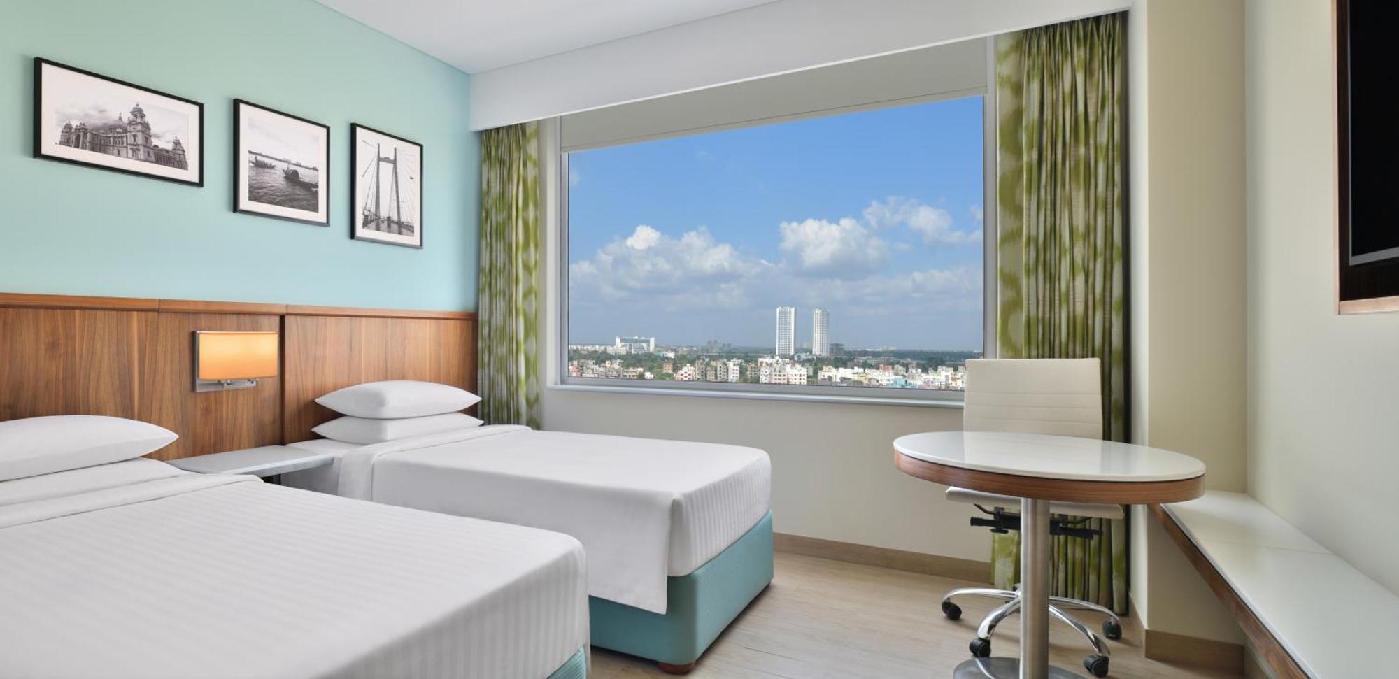 Executive Twin Room - One-way airport transfer & INR 1,000 Hotel Credit per stay, Happy Hours (1+1 IMFL - 4 PM to 8 PM) at Vertex