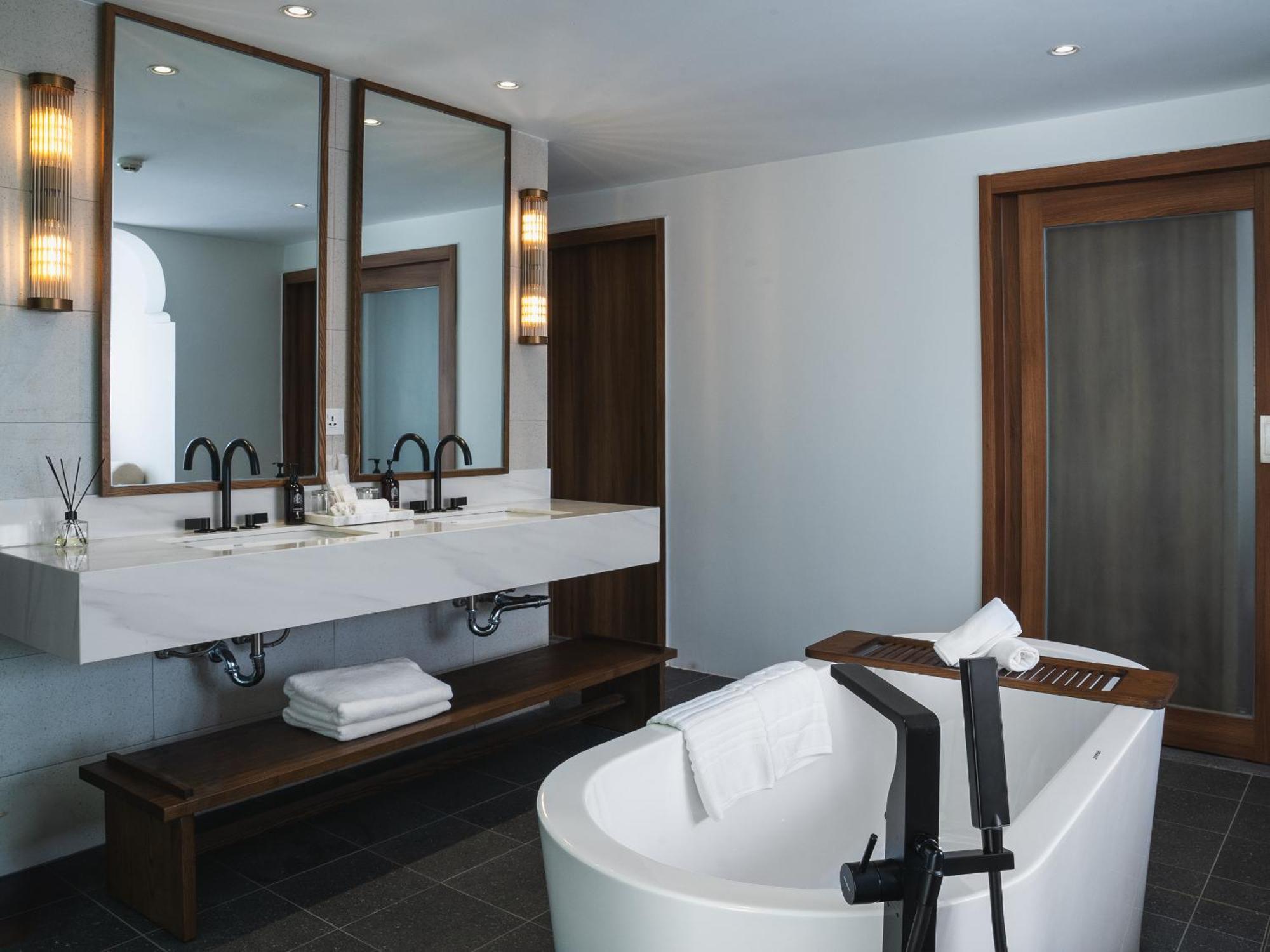 Duplex Prestige Suite Private Pool A bottle of High Tea