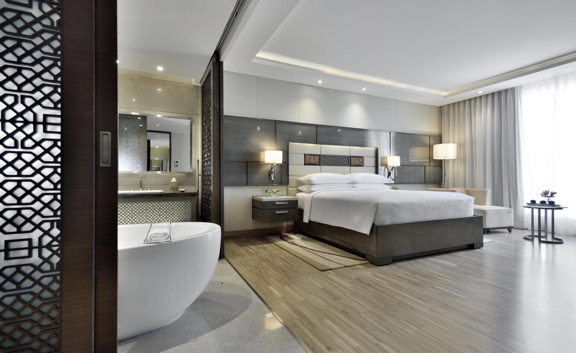 Executive King Room Pool View Lounge Access & complimentary one-way airport transfer BOM T1 & T2