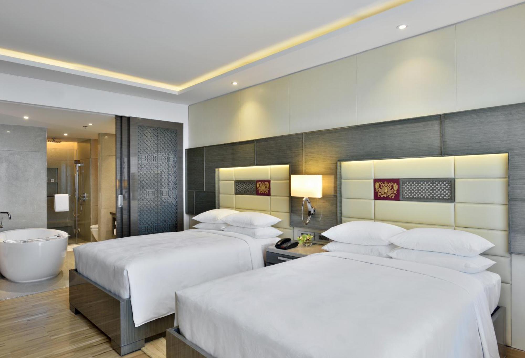 Guest Room Executive lounge access 2 Double Pool View & complimentary one-way airport transfer BOM T1 & T2