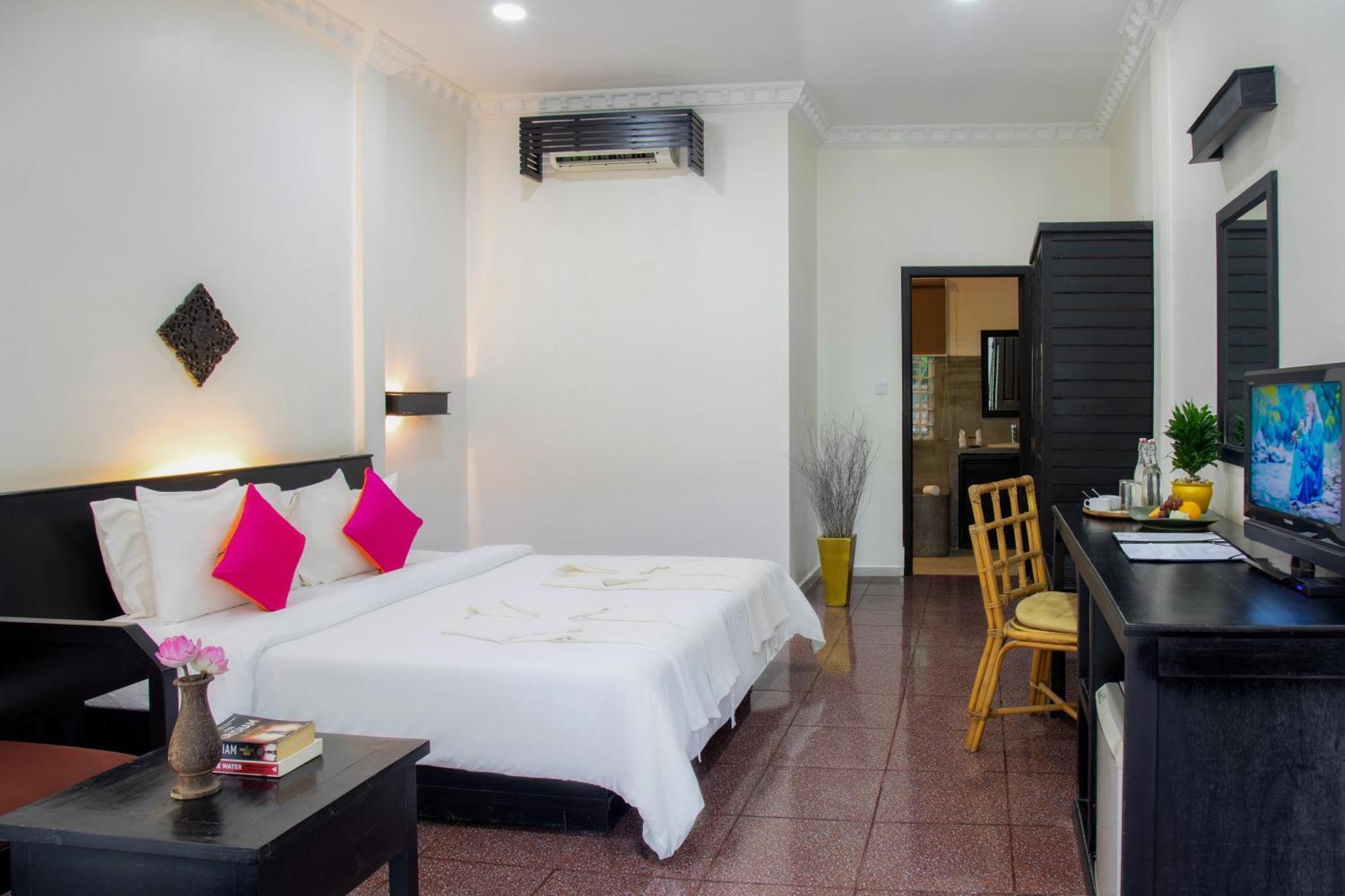 Deluxe Quadruple Room Balcony