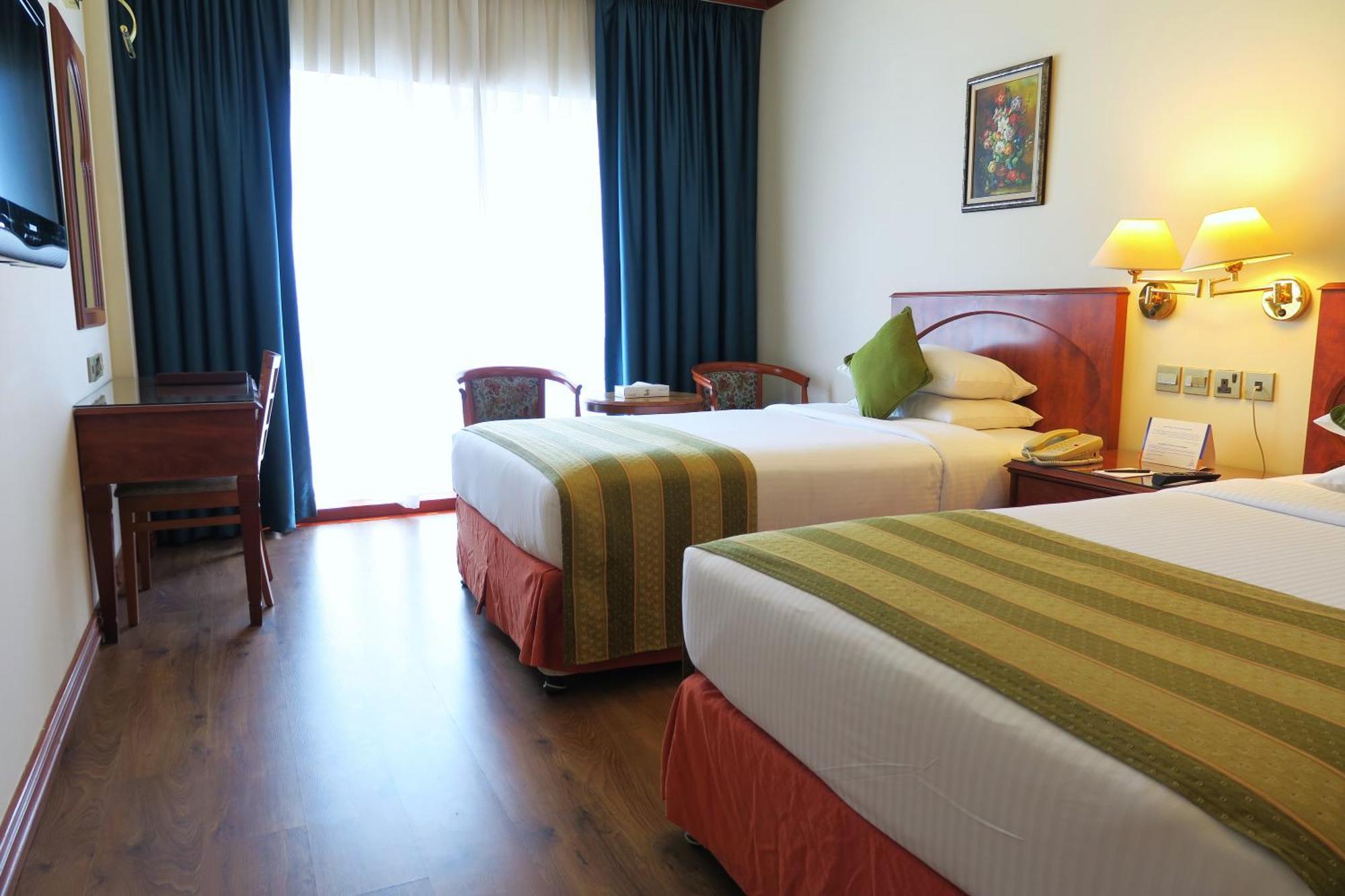 Standard Twin bed-Creek View Balcony