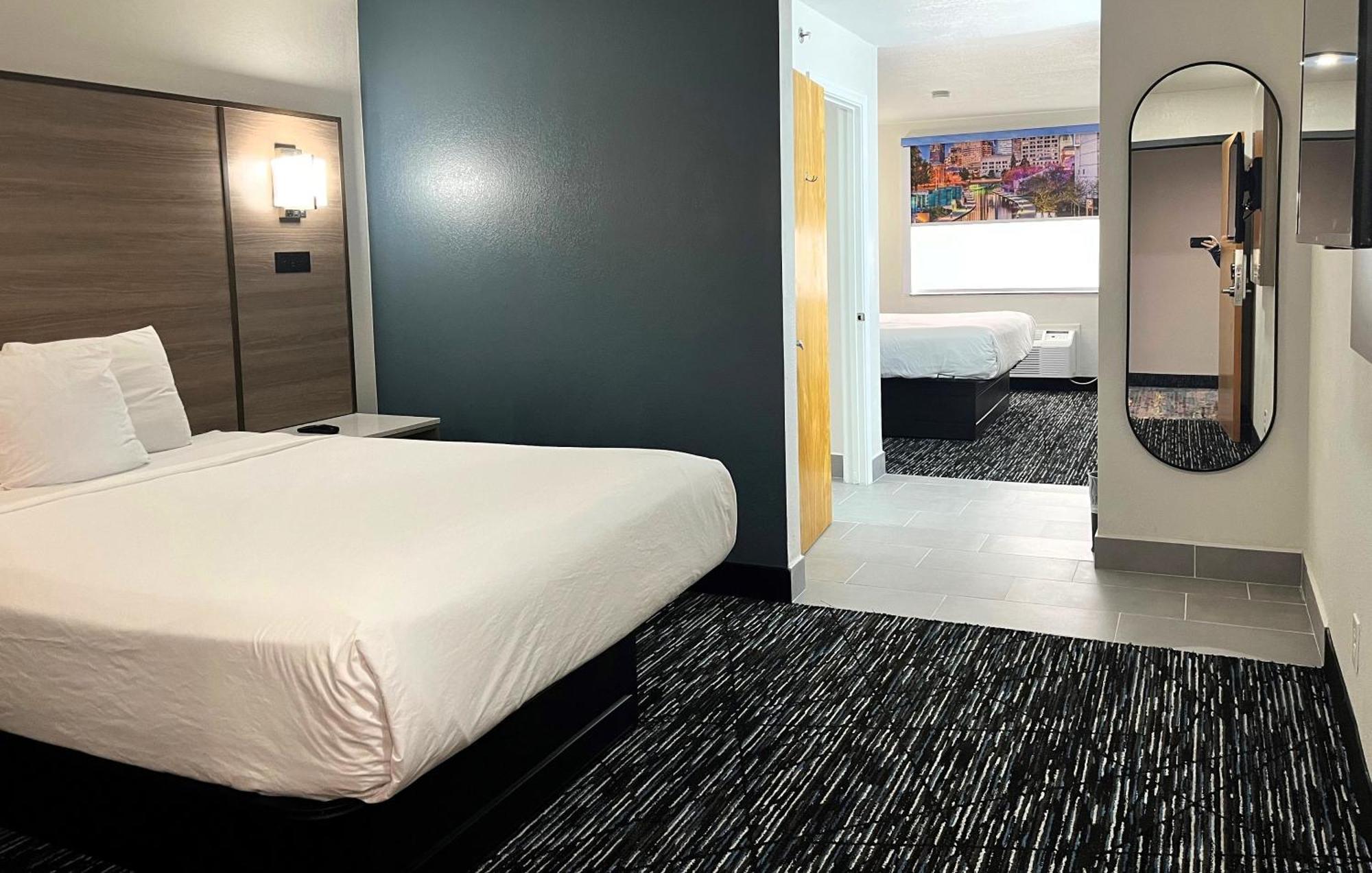 Suite with One King Bed and One Queen Bed- Non-Smoking