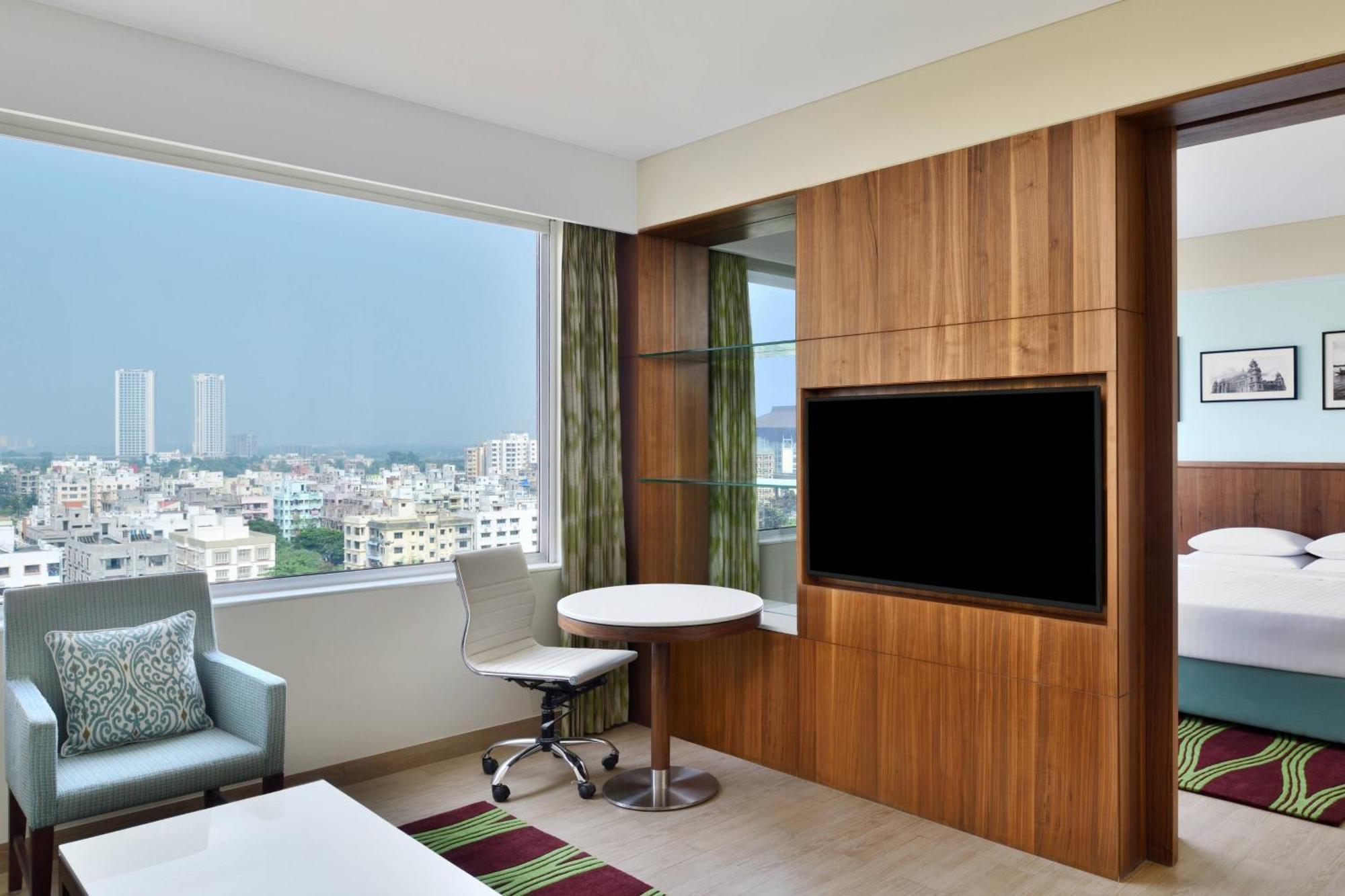 Fairfield Suite One-way airport transfer & INR 1000 Hotel Credit per