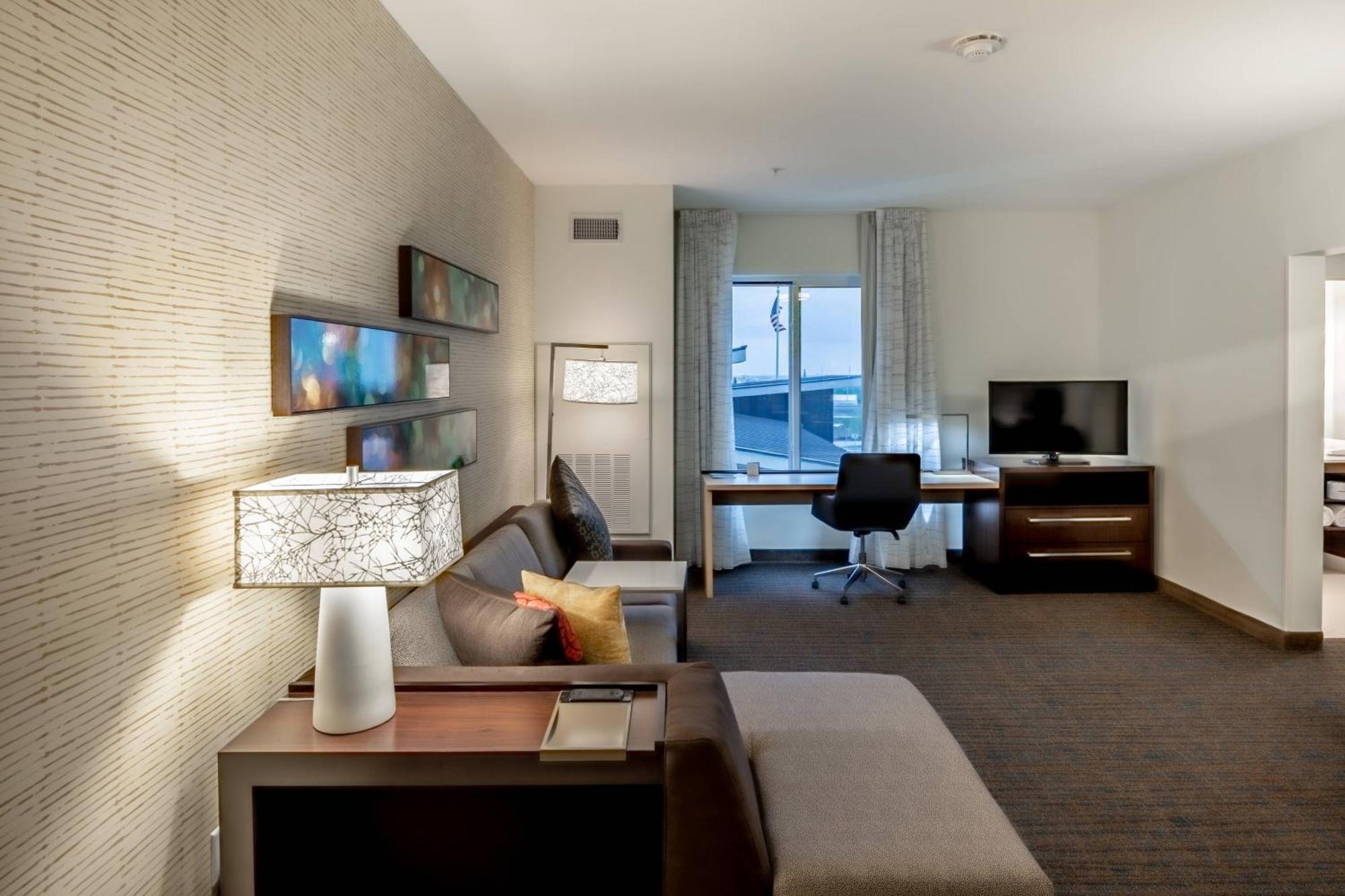 One Bedroom King Suite with Sofa Bed and City View