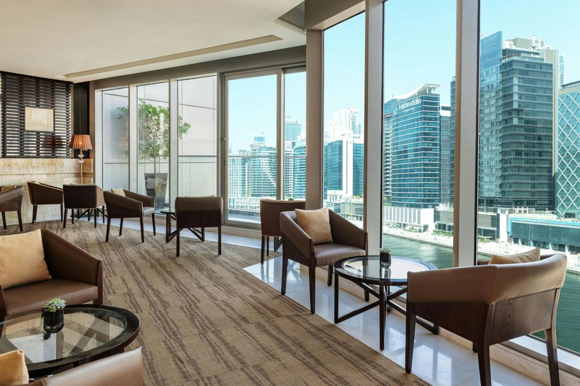 One-Bedroom King Suite Canal Bay View Lounge Access complimentary Daily Snacks Evening Cocktail Hour & Canapes Complimentary Shuttle to Dubai Mall Bay Metro Station & Kite Beach