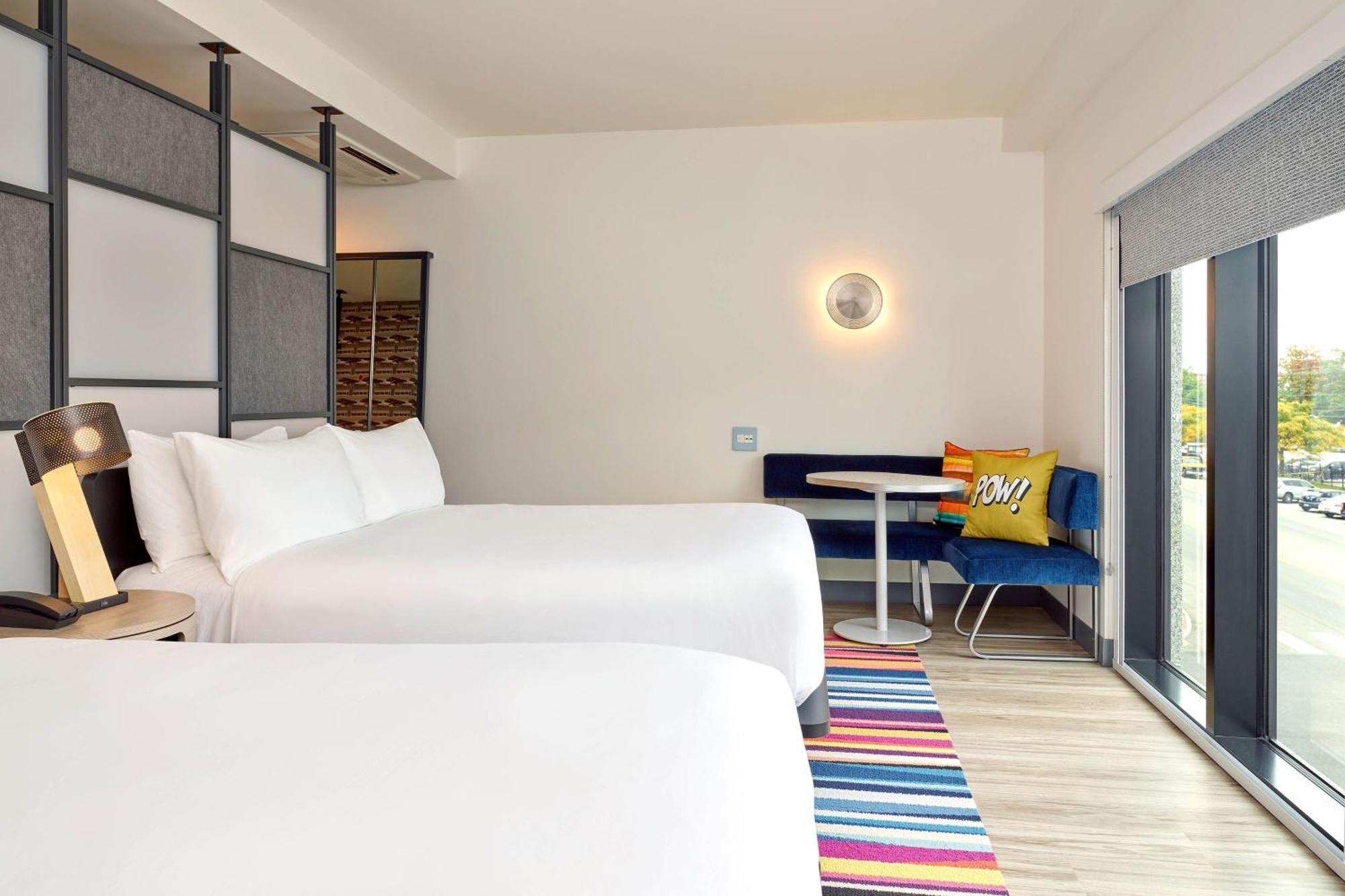 Corner Queen Room with Two Queen Beds, City View and Roll-In Shower - Mobility Access