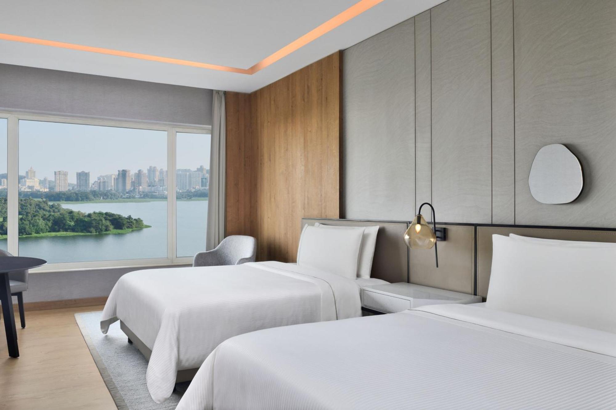 Larger Guest 2 Double Bed Room Lake View Curated high-tea experience & enjoy on F&B Spa