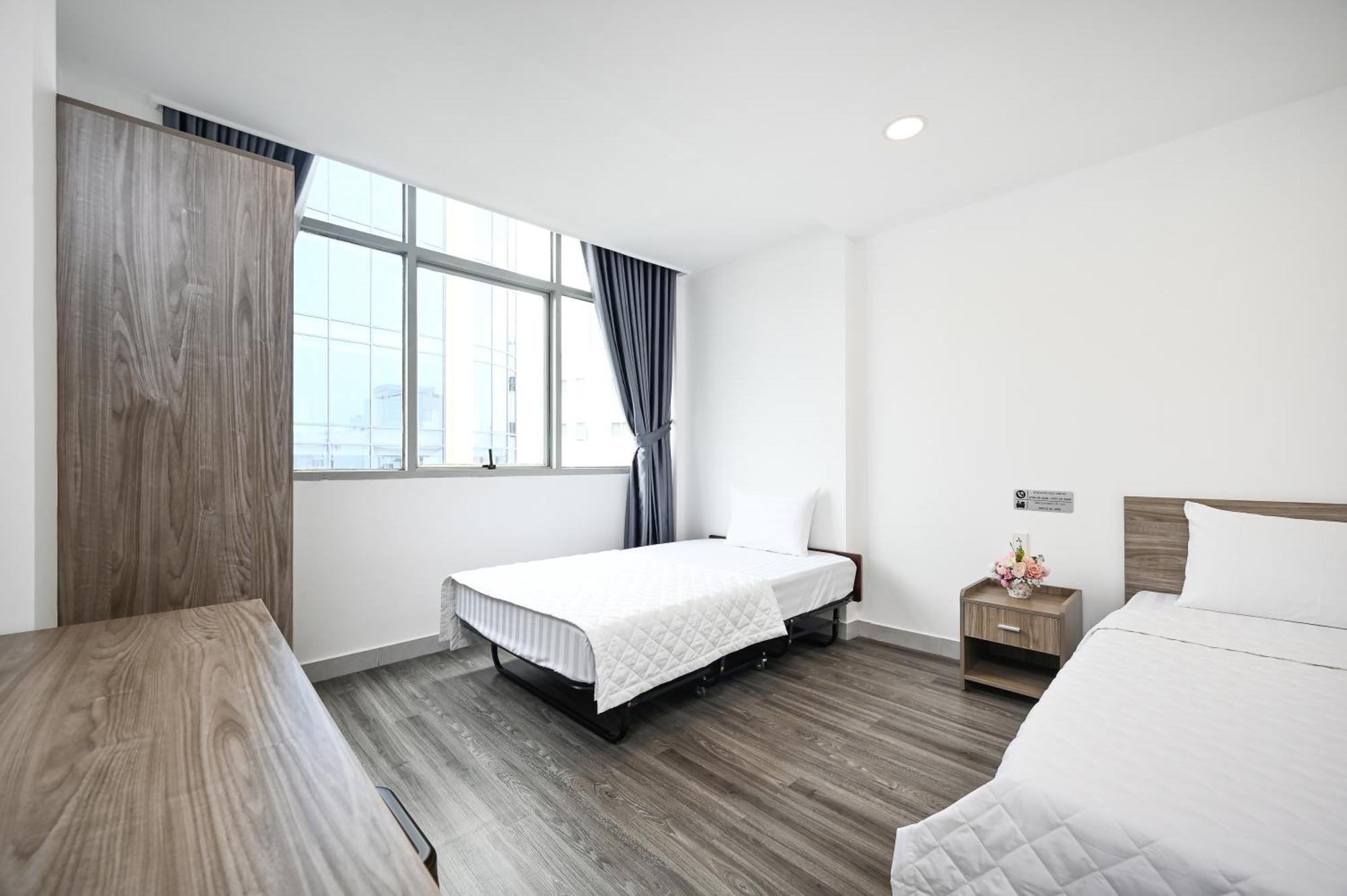 Deluxe Triple Room City View