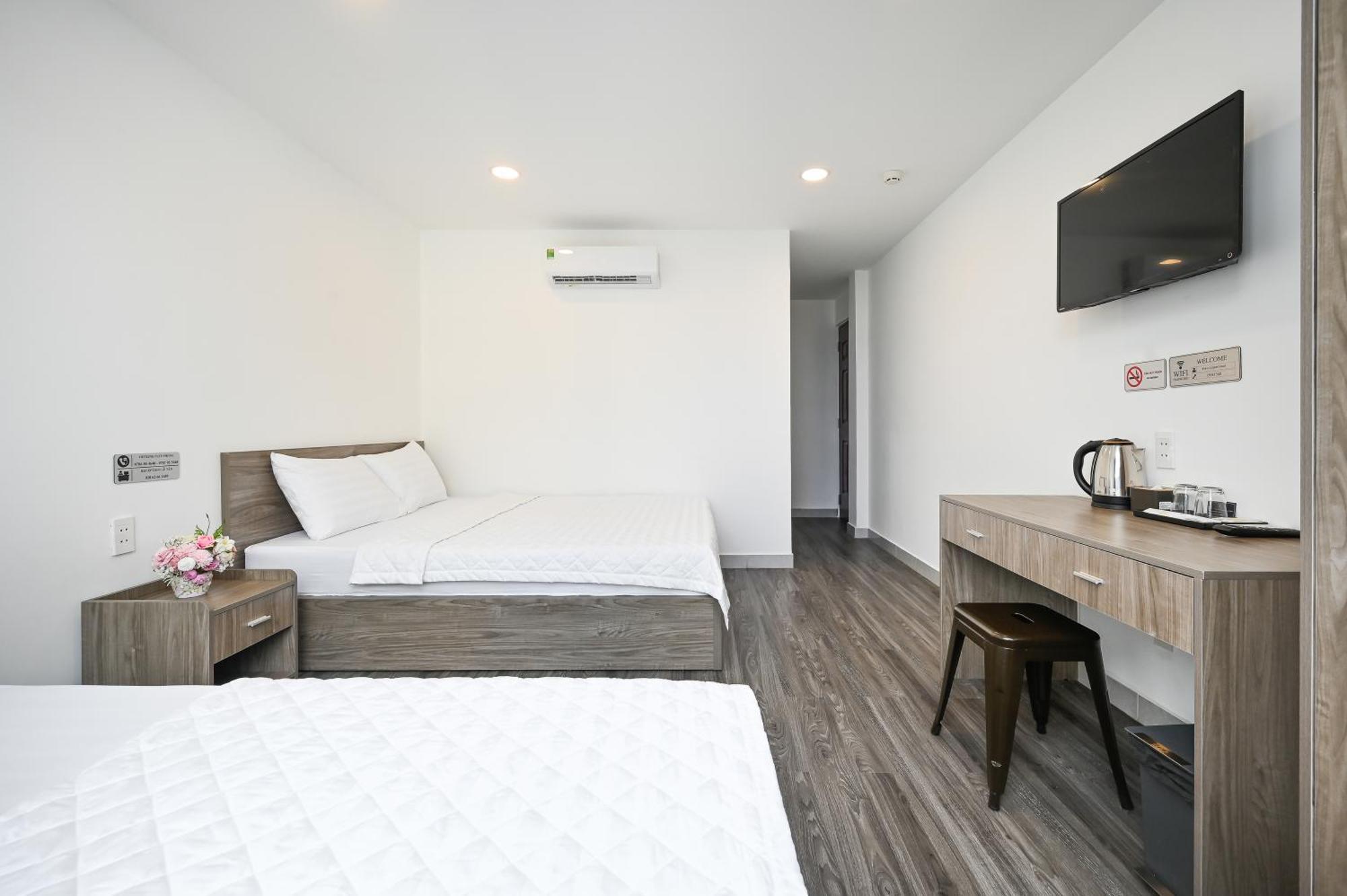 Deluxe Triple Room City View