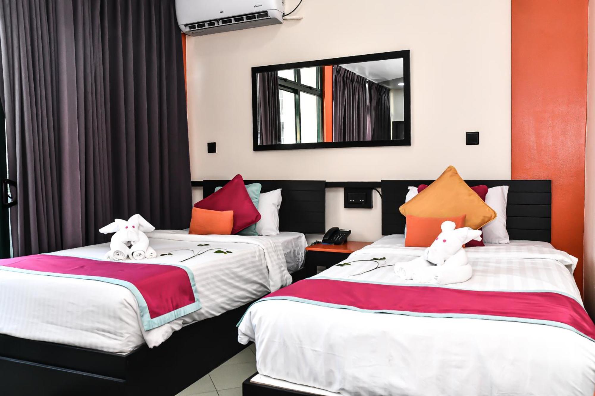 Deluxe Double or Twin Room Return Airport Transfer on Food & Beverage