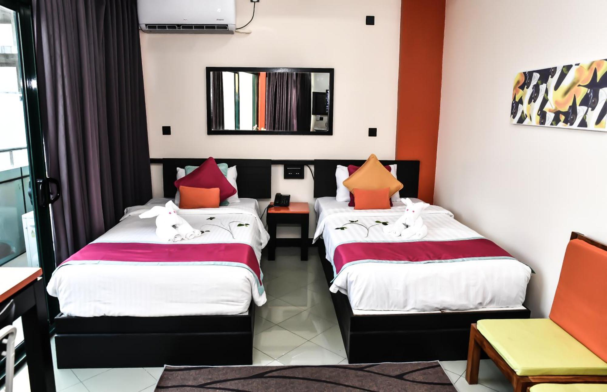 Deluxe Double or Twin Room Return Airport Transfer on Food & Beverage