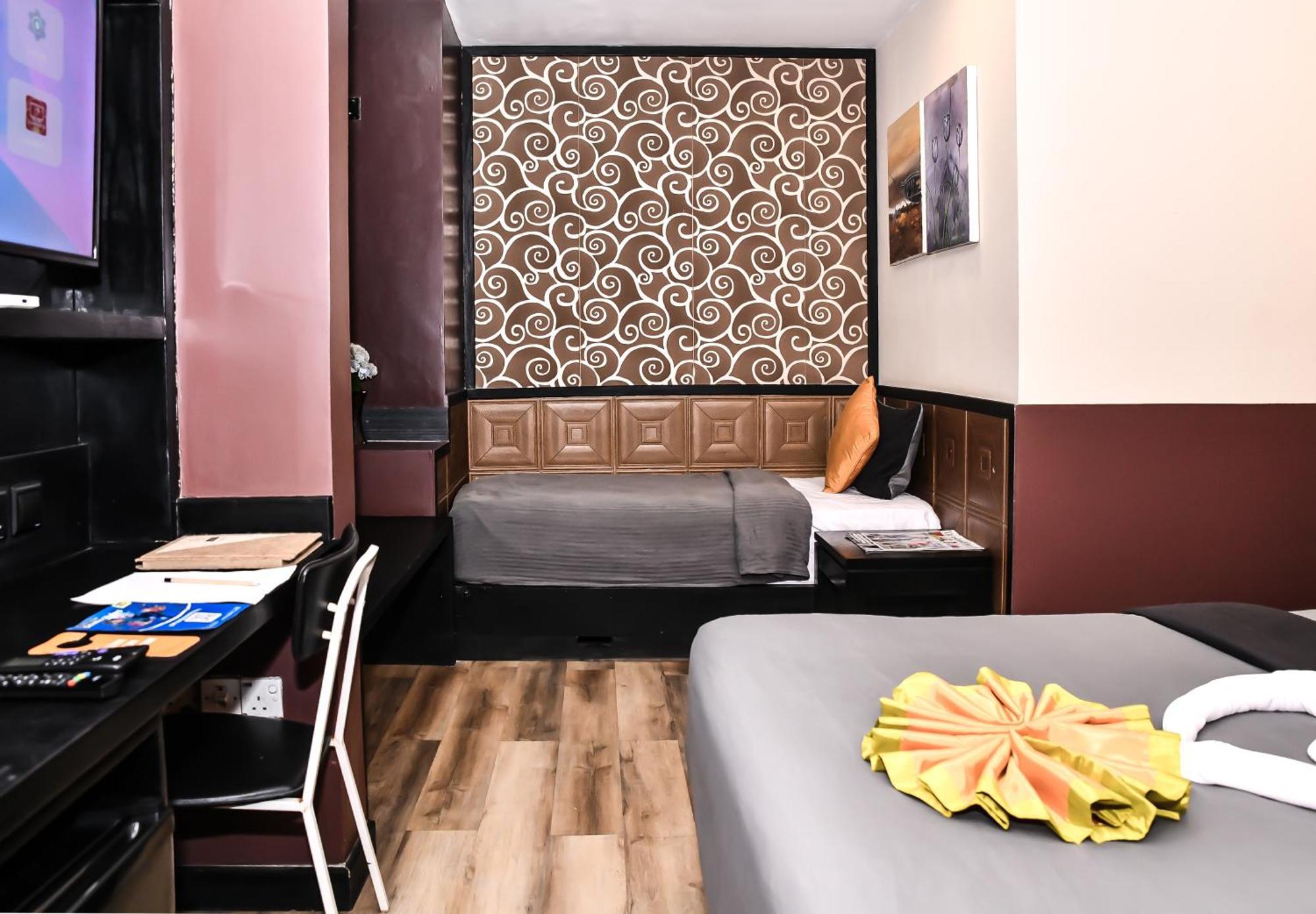 Deluxe Triple Room