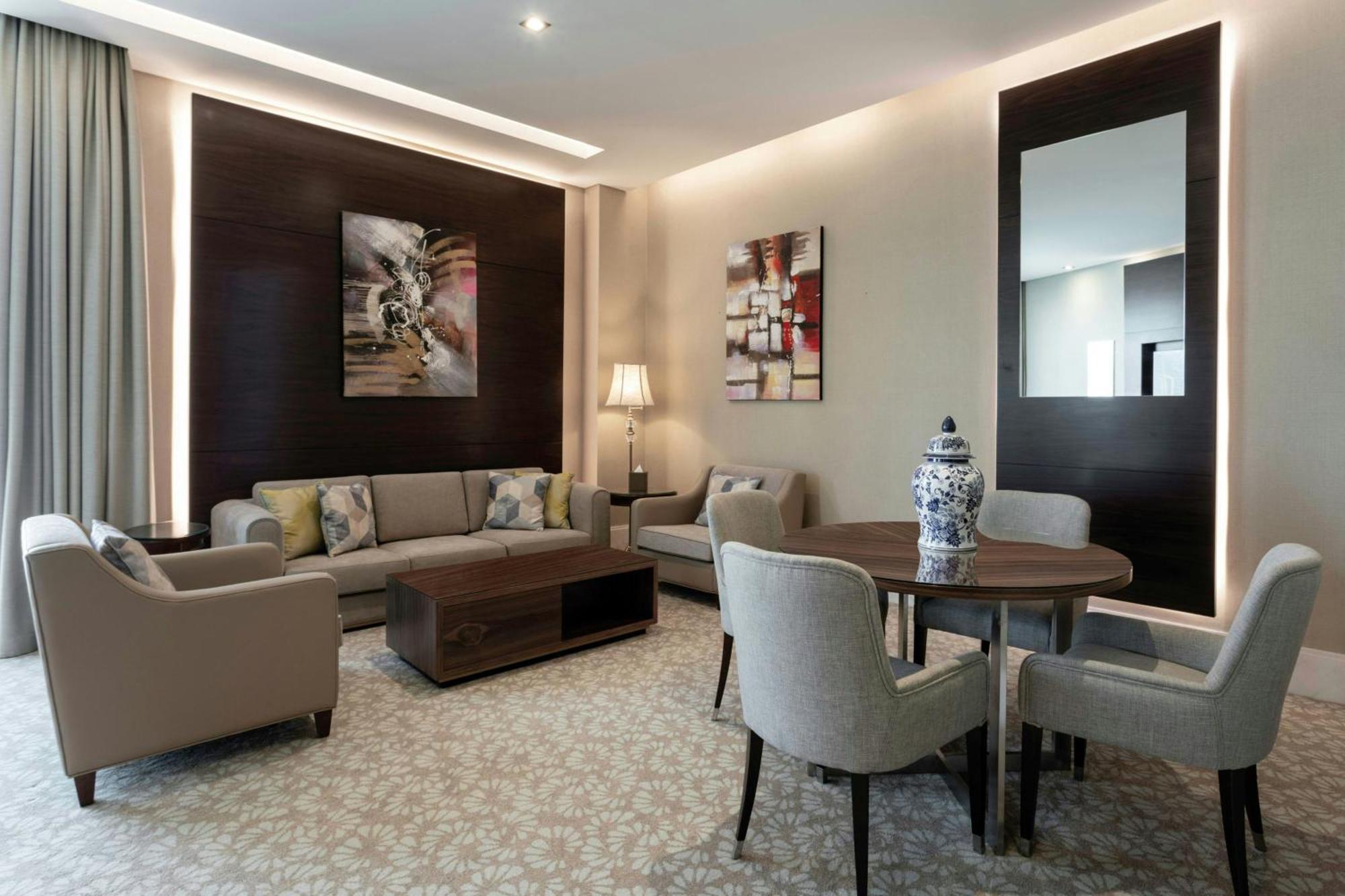 One-Bedroom King Suite Canal Bay View Lounge Access complimentary Daily Snacks Evening Cocktail Hour & Canapes Complimentary Shuttle to Dubai Mall Bay Metro Station & Kite Beach