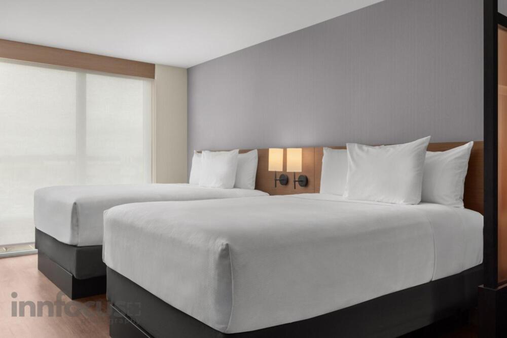 Queen Room with Two Queen Beds and Sofa Bed - High Floor