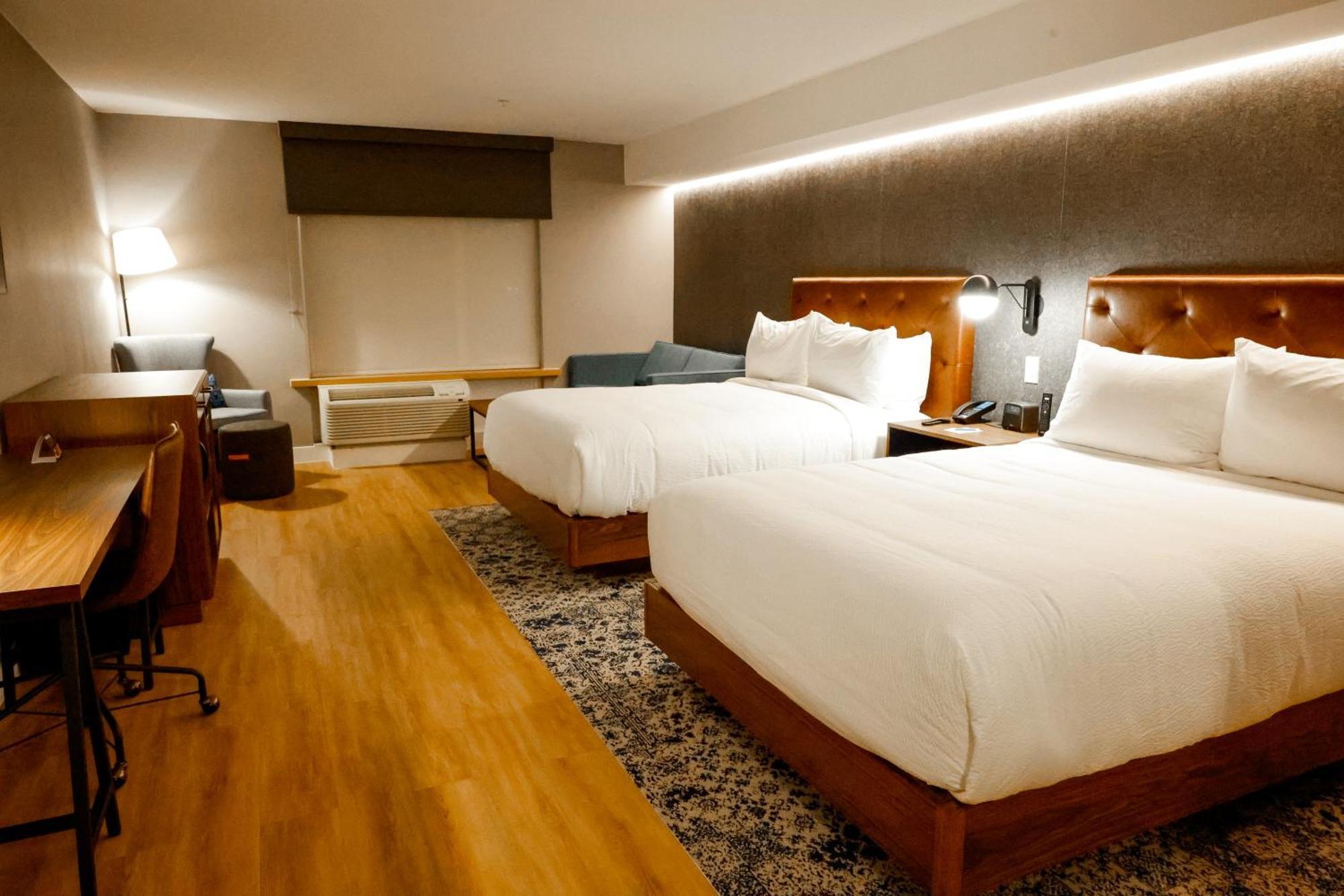 Deluxe Queen Room with Two Queens and One Sofa Bed - Mobility/Hearing Accessible w/Tub