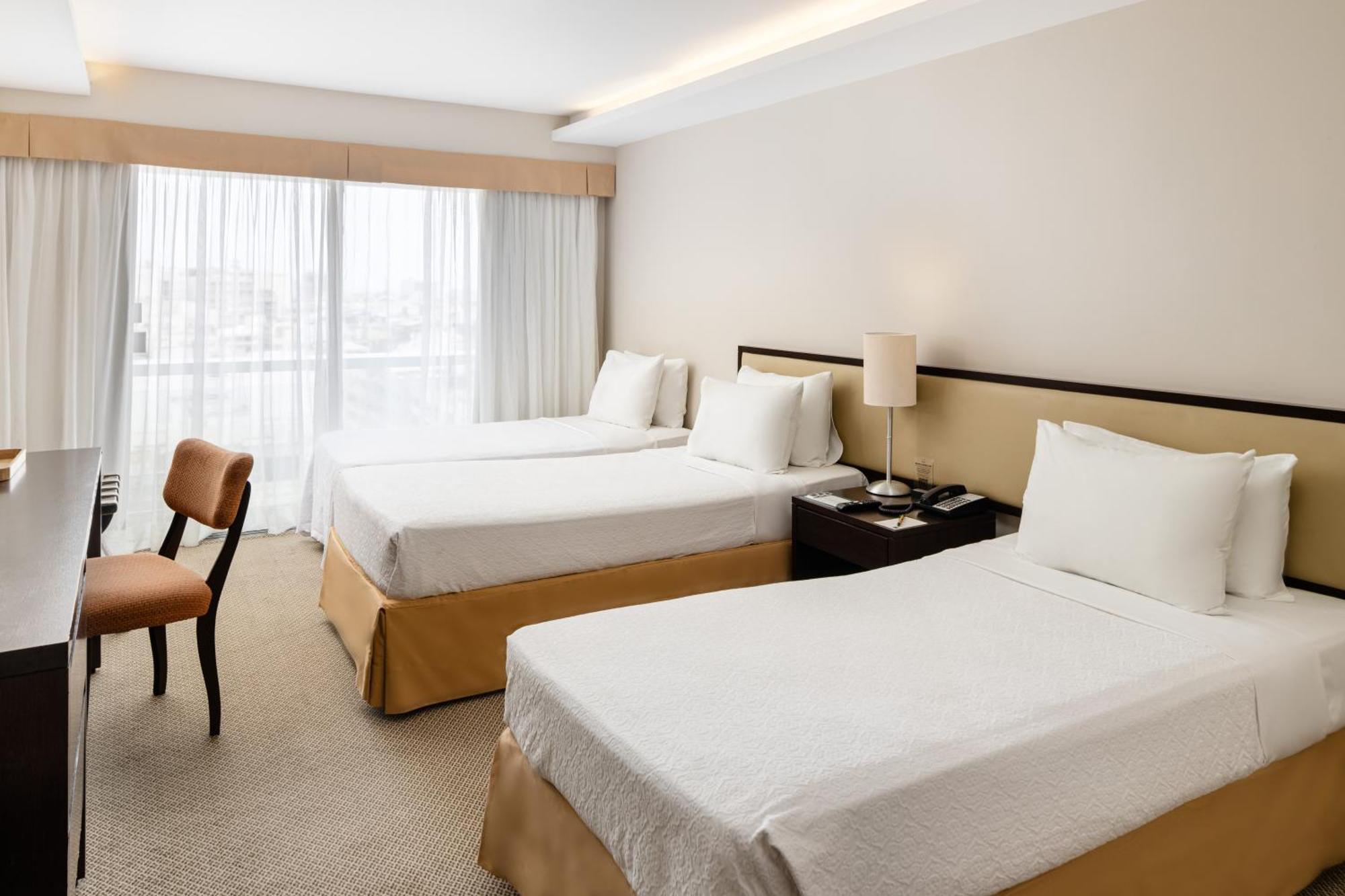Classic Triple Room Side Sea View