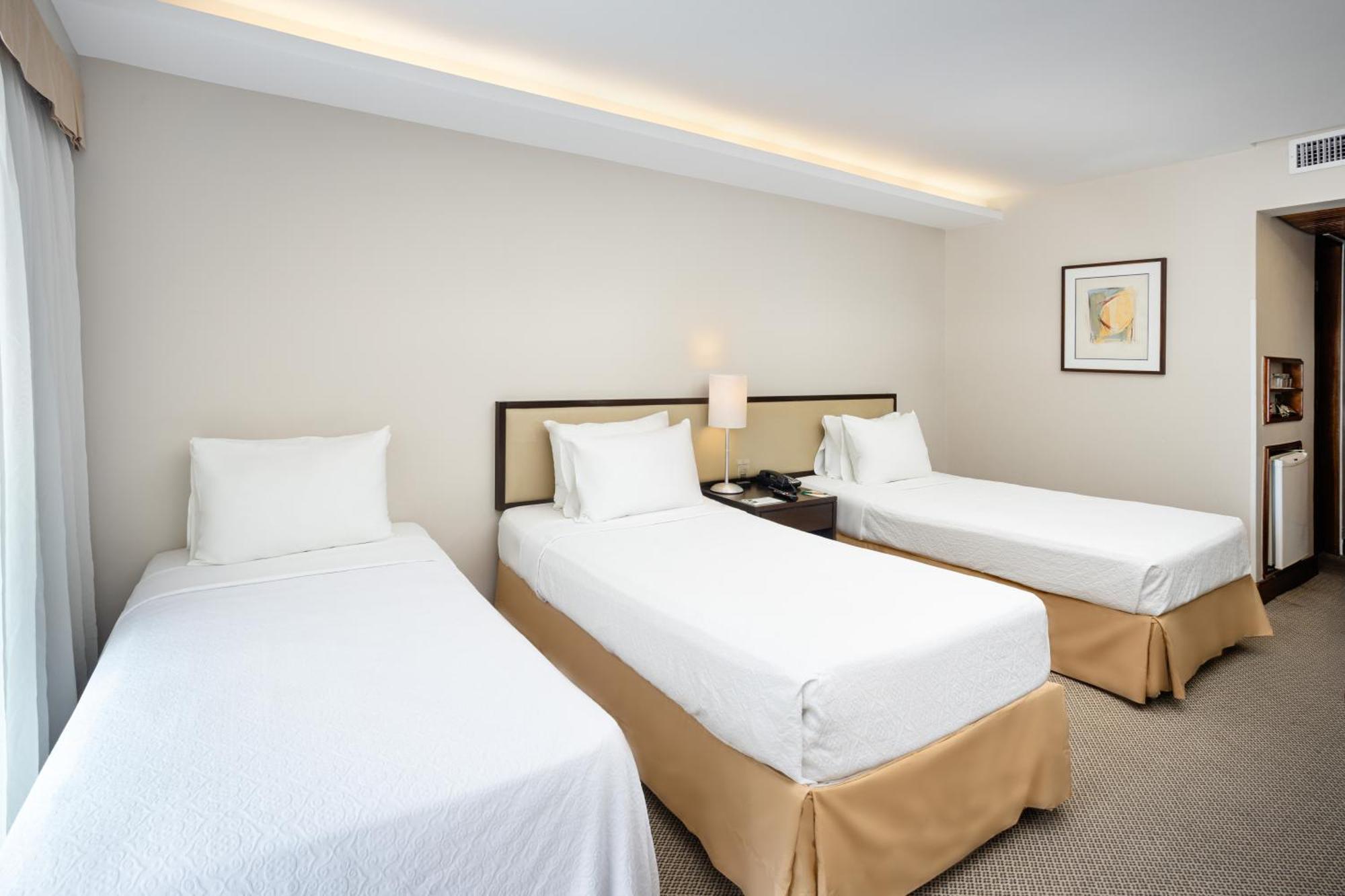Classic Triple Room Side Sea View