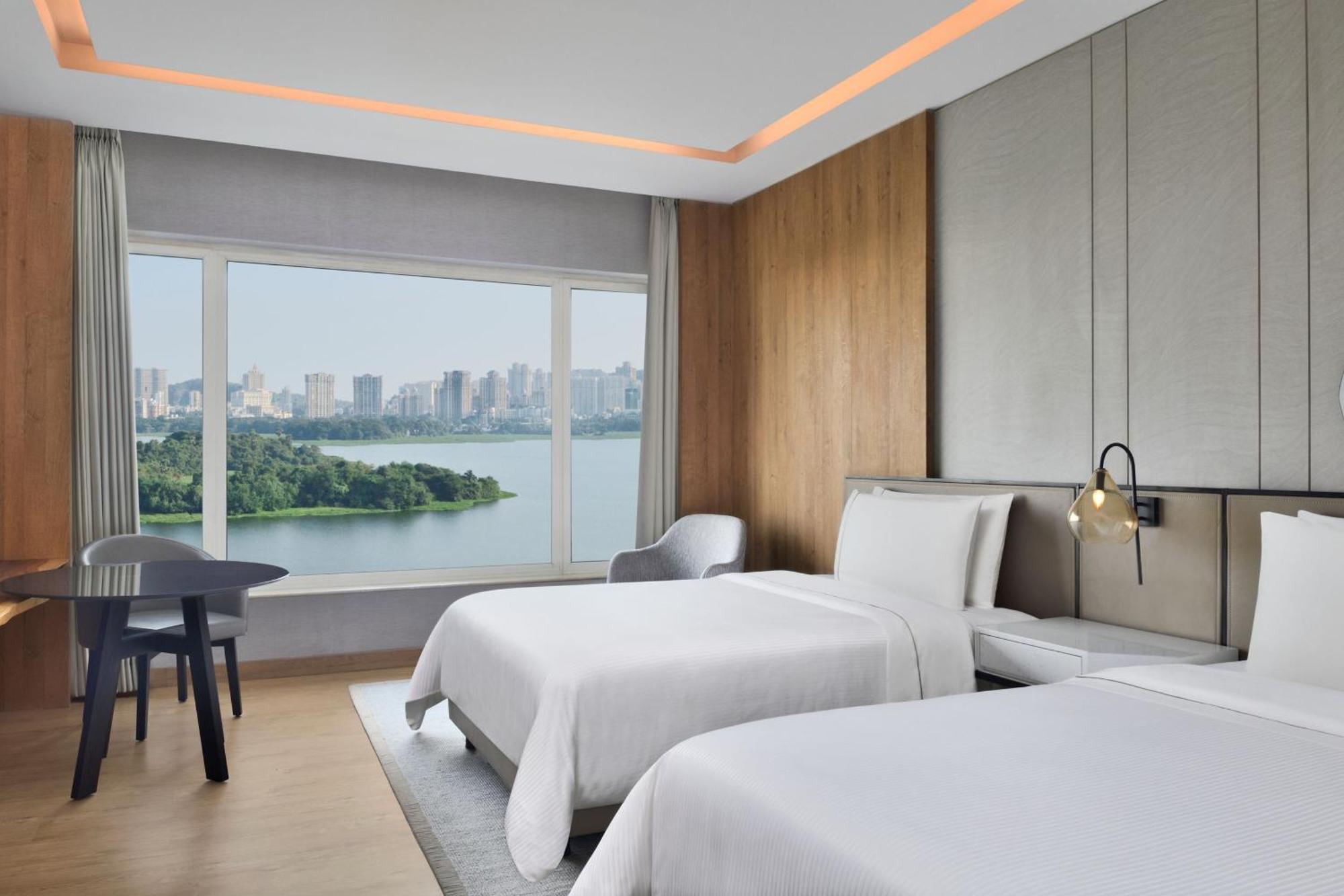 Club Larger Guest Room 2 Double Bed Lake view Curated high-tea experience & enjoy on F&B Spa