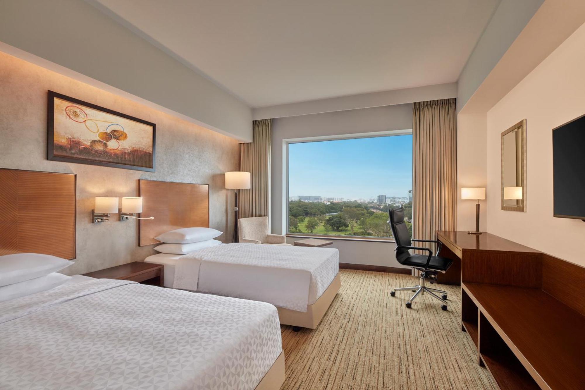 Executive Twin Bed Room on Food & Soft Beverages Complimentary Lounge Access 2 IMFL drinks & snack buffet during 1800 to 2000 hrs