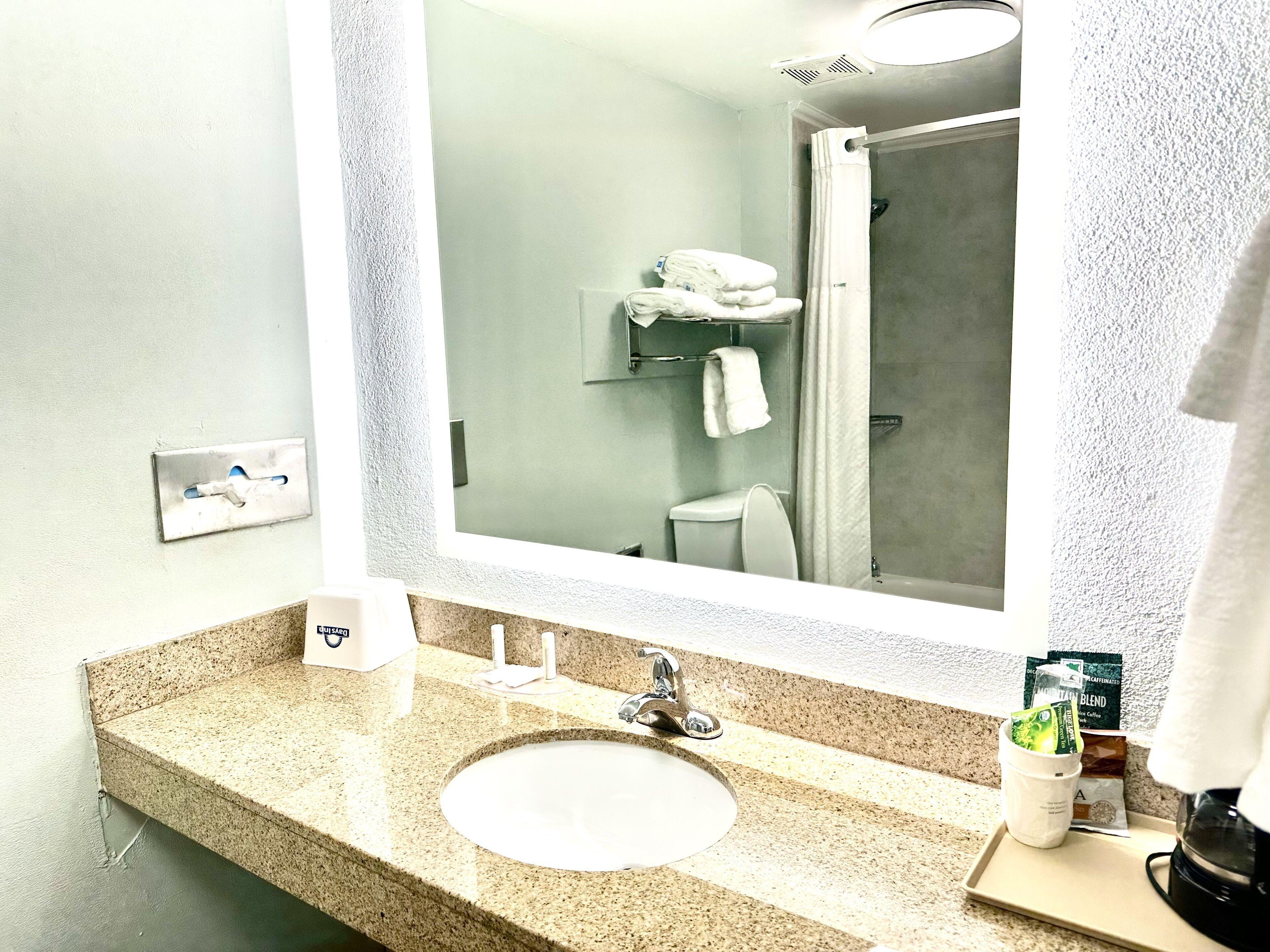 Room One King Two Double Beds Bath Tub Mobility Accessible or Non-Smoking