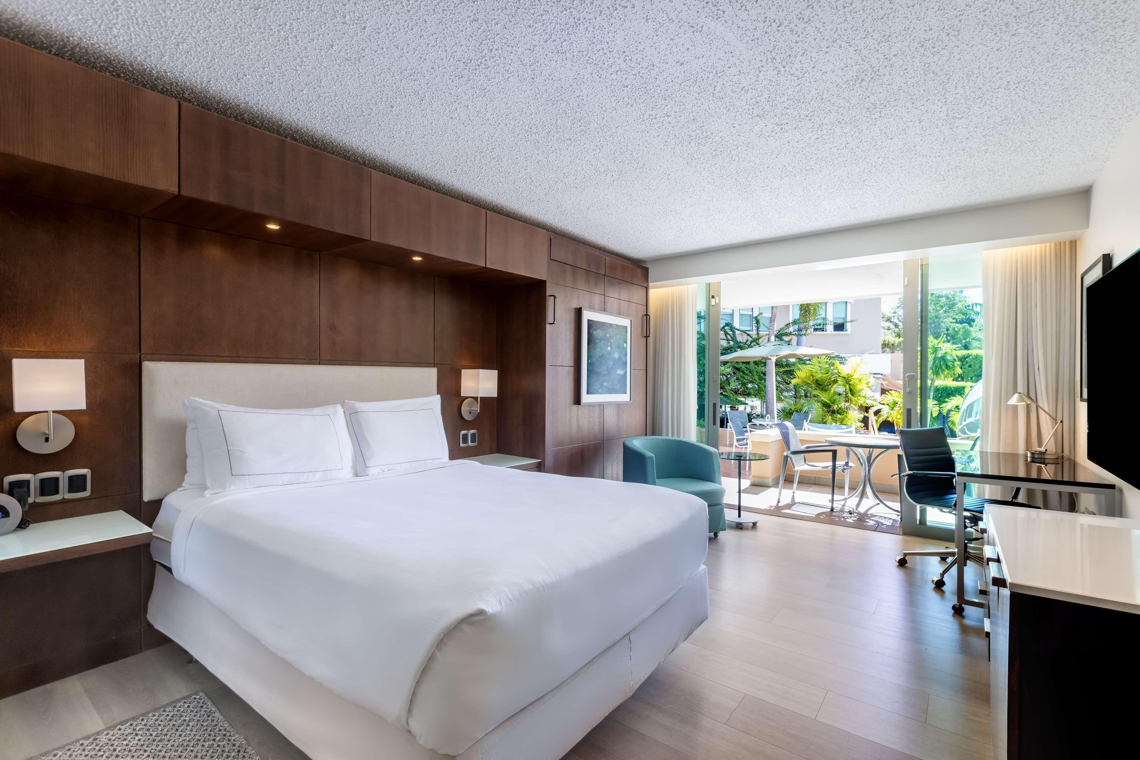 Queen Room Extra Double Bed Balcony Garden View