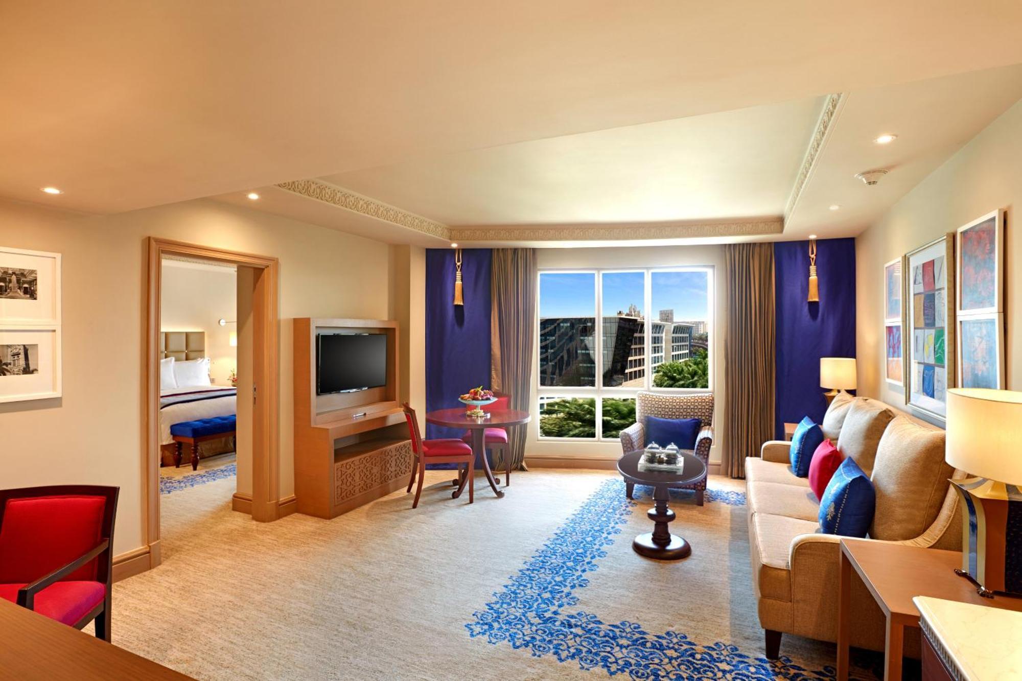 Deluxe King Suite Club Lounge Access Airport pickup Butler service on Spa Laundry Food & Soft Beverage Complimentary Luxury Hours from 6 to 8 PM