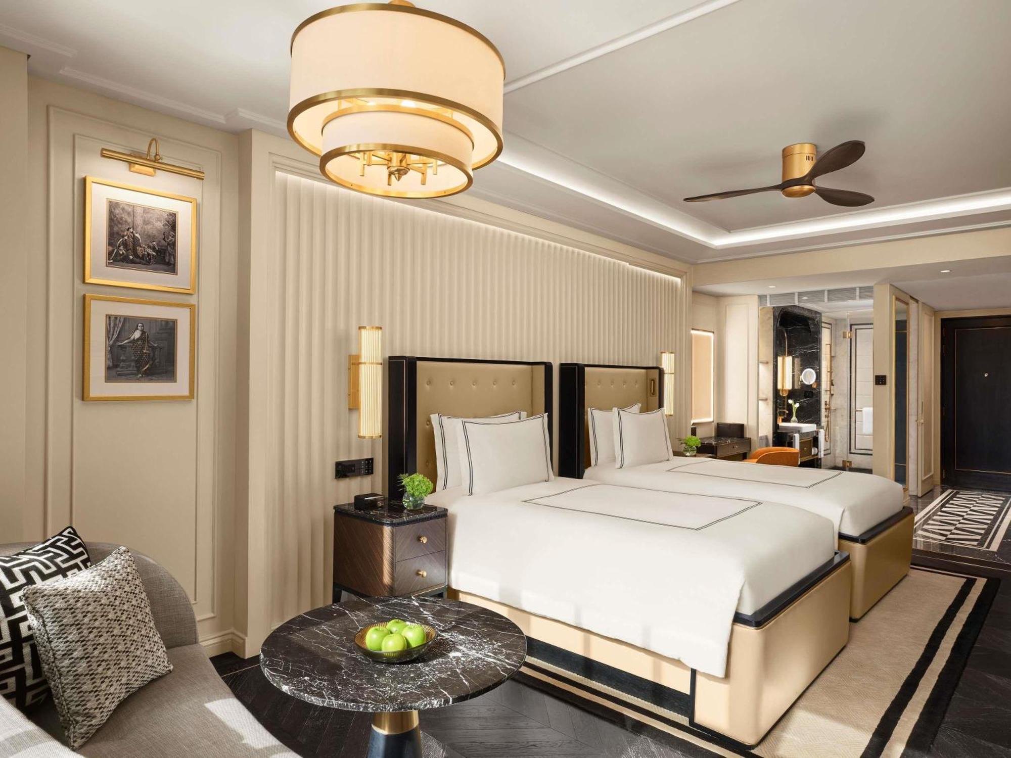 Fairmont Twin Room with Pool View and Complimentary Airport Transfers (T1 & T2) , Soft Mini Bar , Daily 4 Piece Laundry(Non Cumulative) and 15% discount on dining (barring IRD & tobacco), Book a 60-Min Spa Session & 50% Off on Cryotherapy*