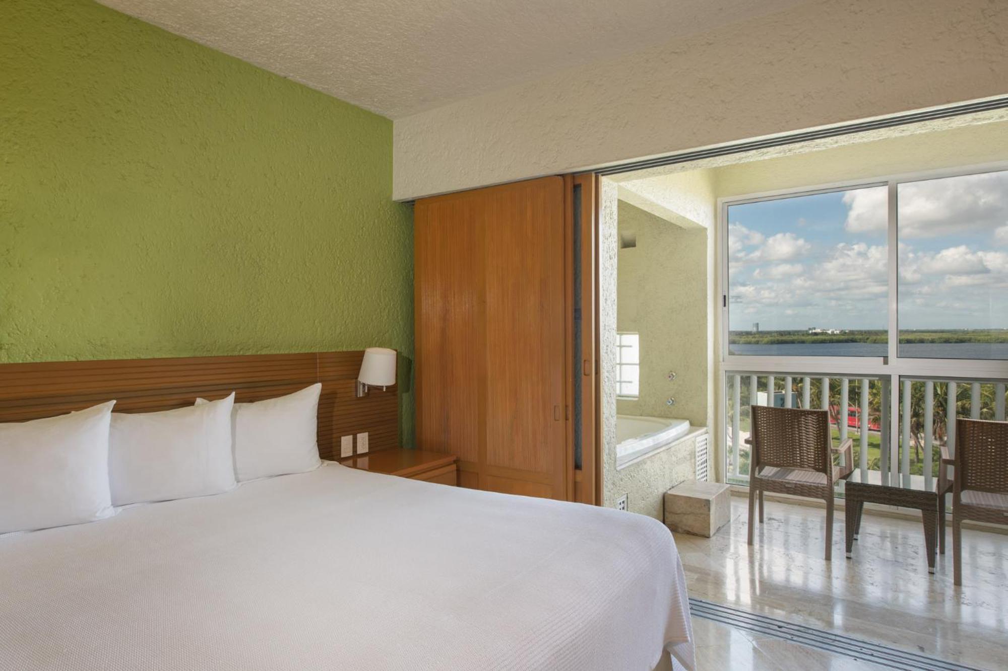 Two-Bedroom Deluxe King Suite Balcony Jacuzzi Lagoon View
