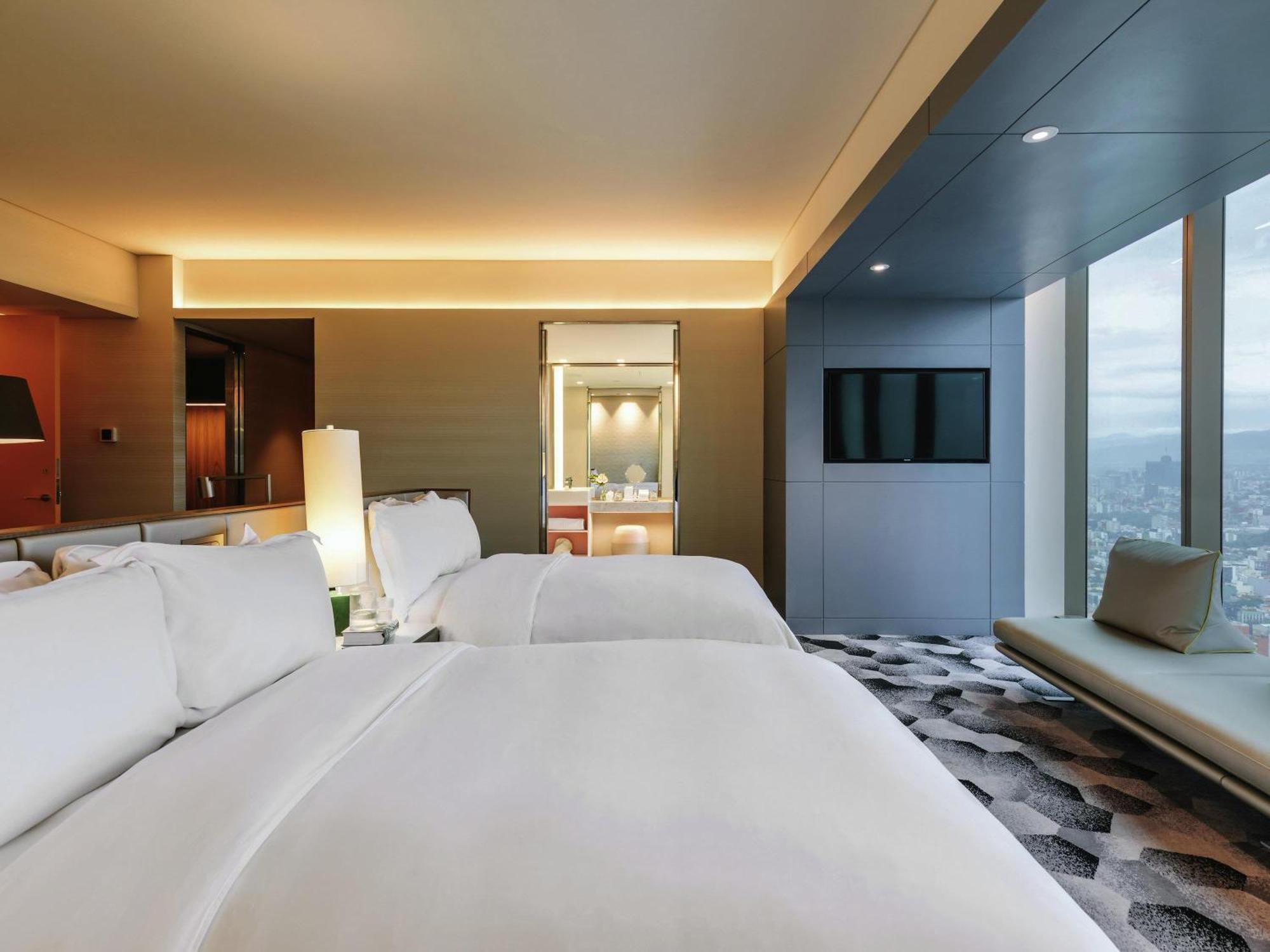 Junior Suite Two Double Beds Skyline View