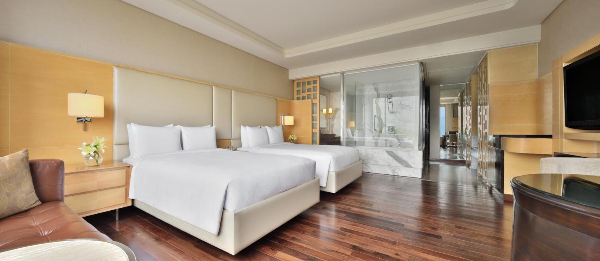 Executive Twin Room complimentary & Club access unlimited IMFL Beverages 5PM to 7PM F&B at JW Café Saffron XO