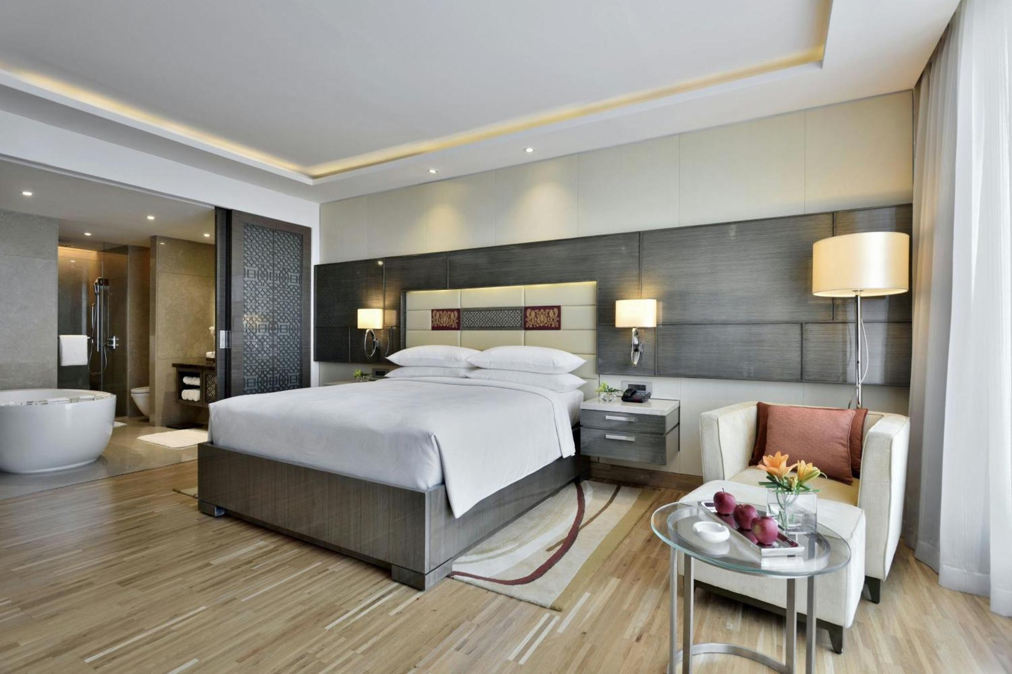 Executive King Room Pool View Lounge Access & complimentary one-way airport transfer BOM T1 & T2