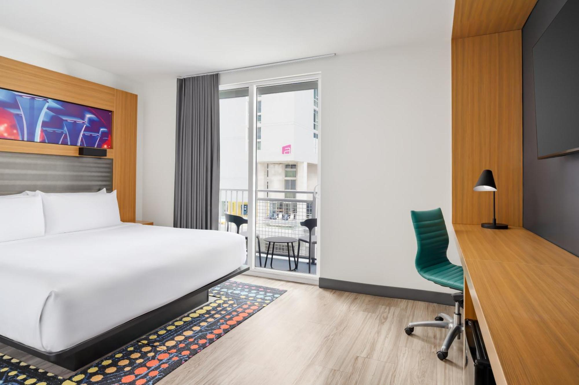 King Room with City View and Balcony - High Floor/Mobility and Hearing Accessible with Roll-In Shower