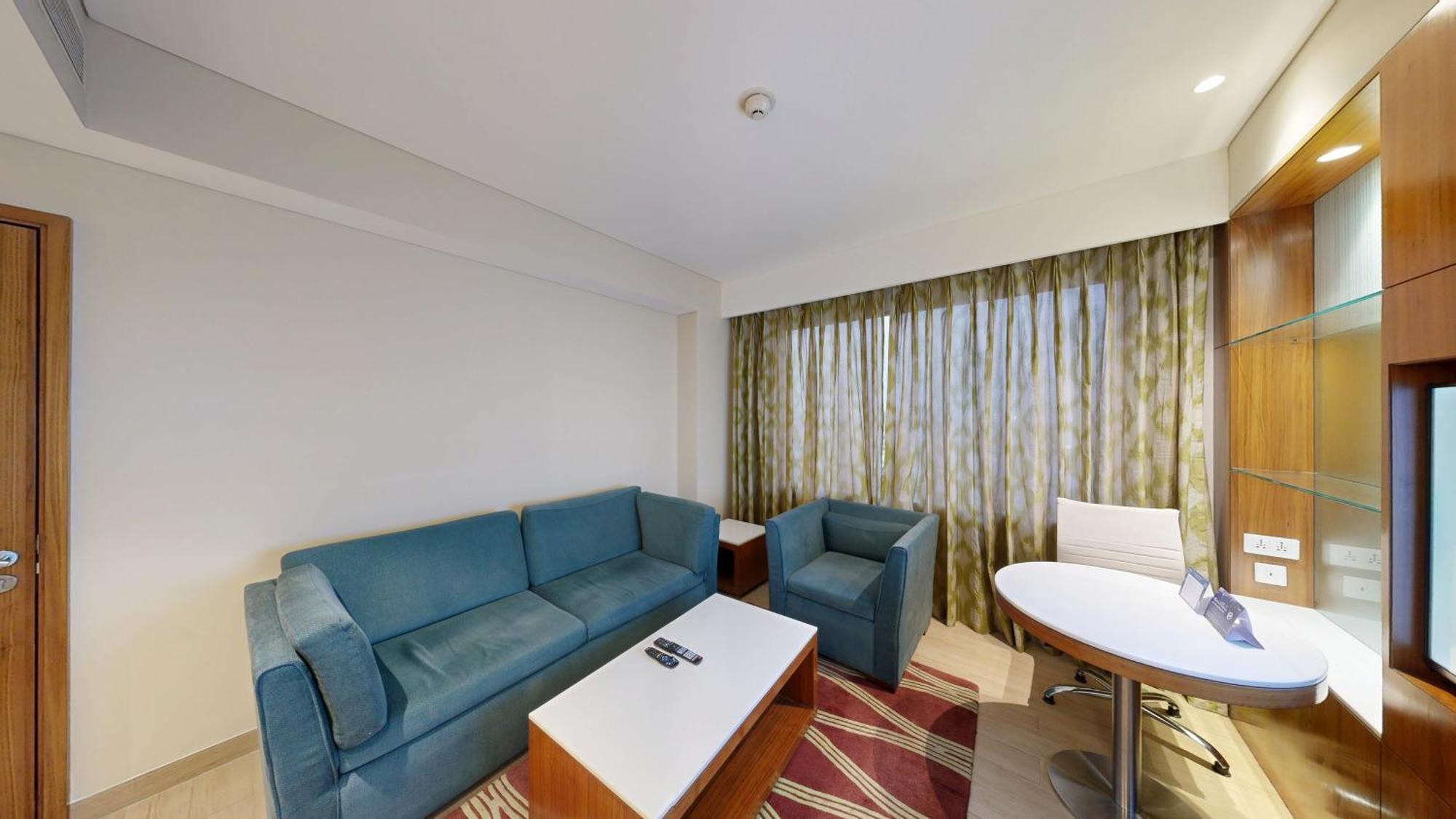 Fairfield Suite One-way airport transfer & INR 1000 Hotel Credit per
