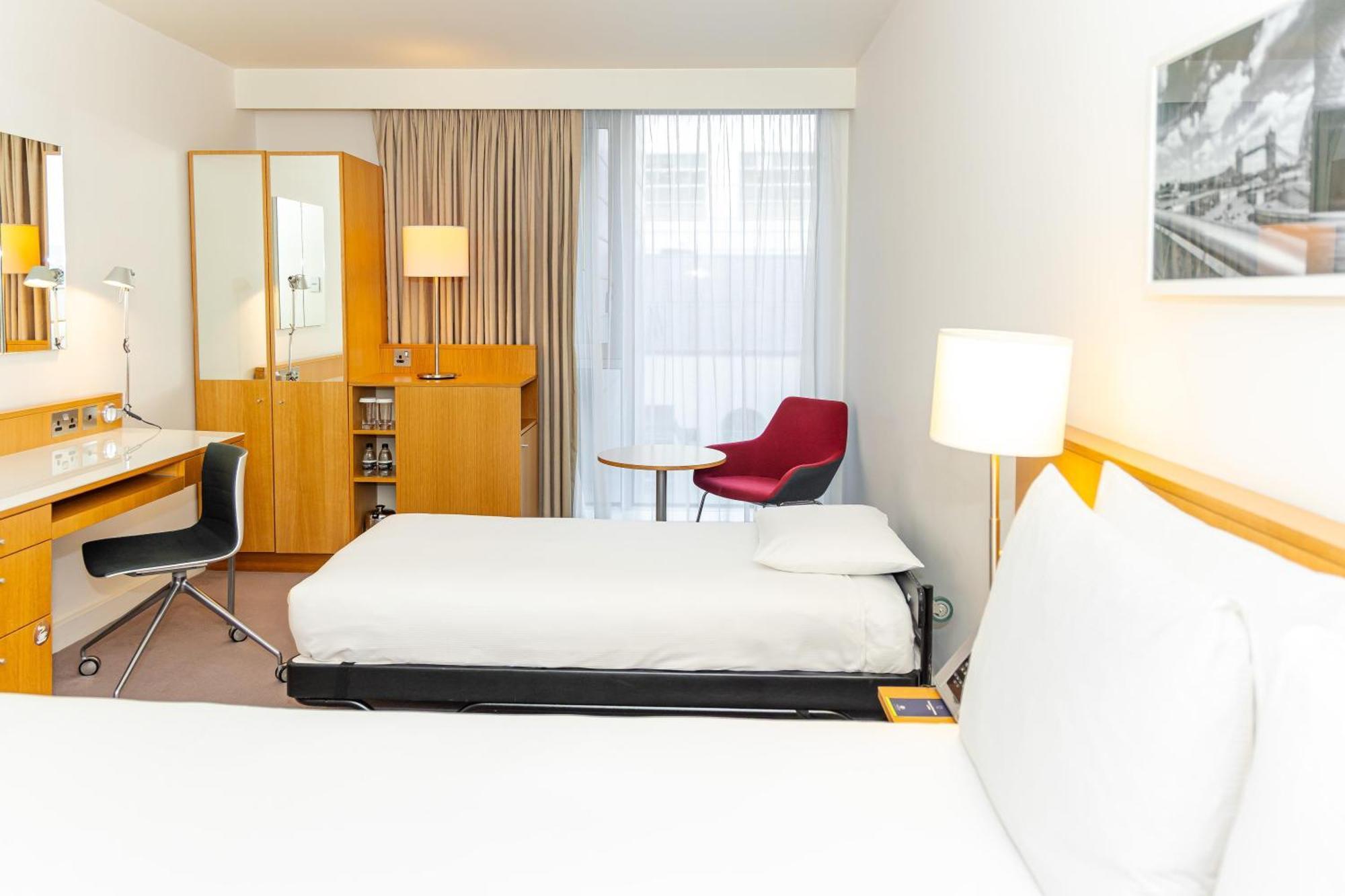 Queen Room One Single Roll-Away Bed